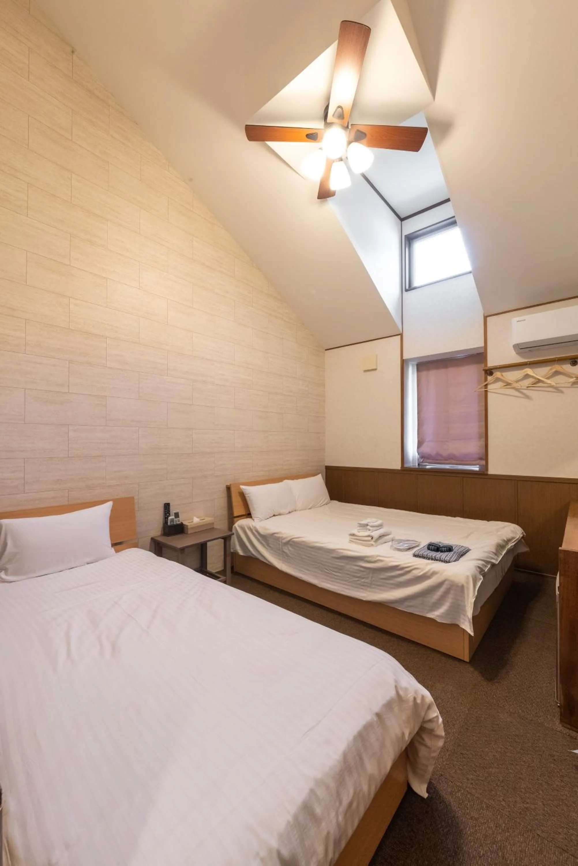 Photo of the whole room, Bed in ETAVIA Yufuin Kinrinko