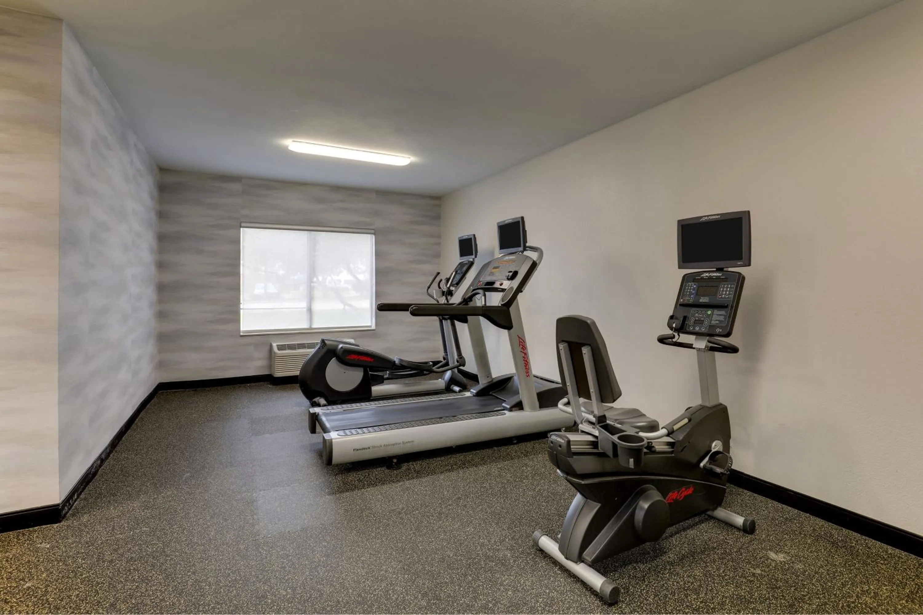 Fitness centre/facilities in Las Colinas Inn Irving, SureStay Collection by Best Western