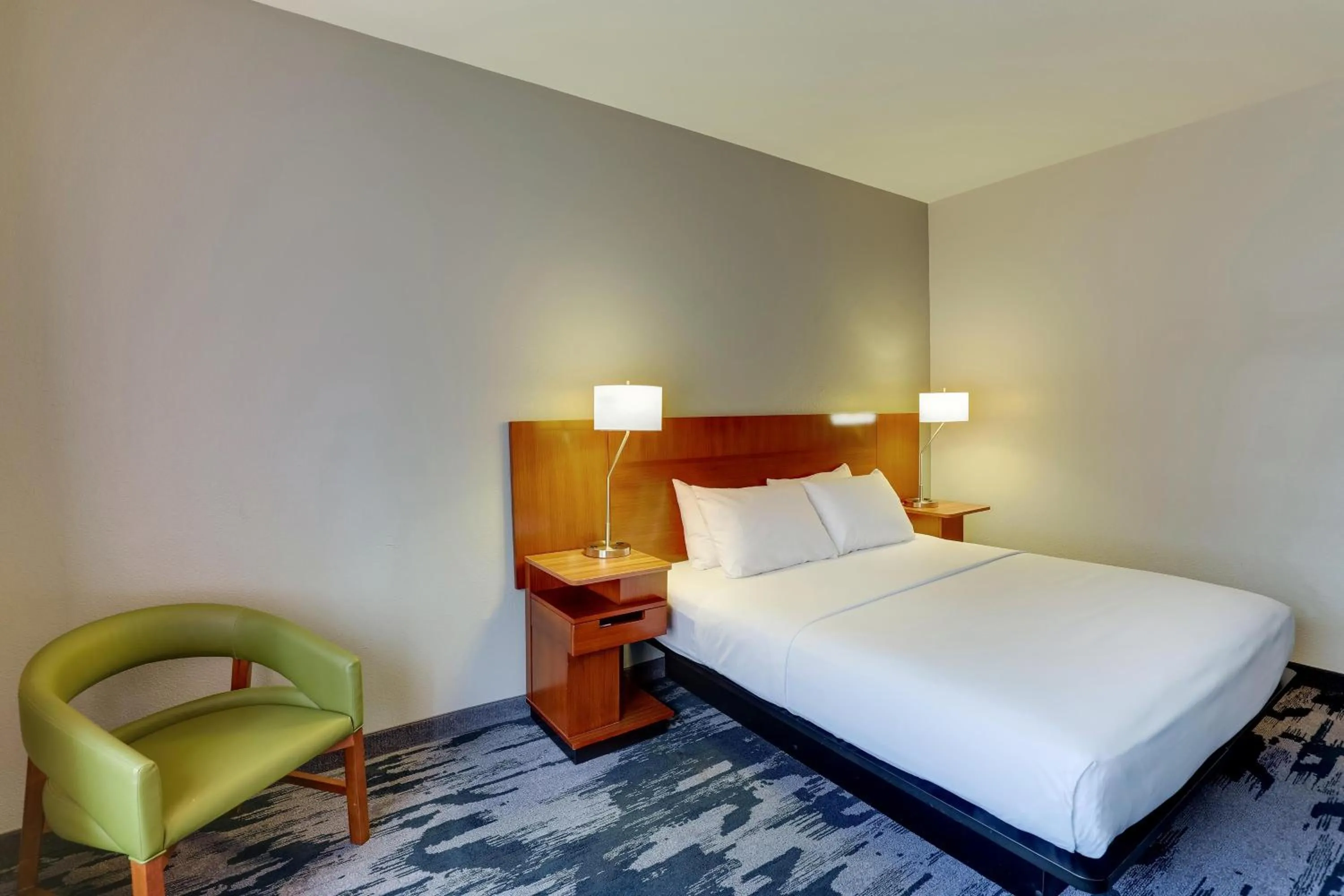 Bedroom in Las Colinas Inn Irving, SureStay Collection by Best Western