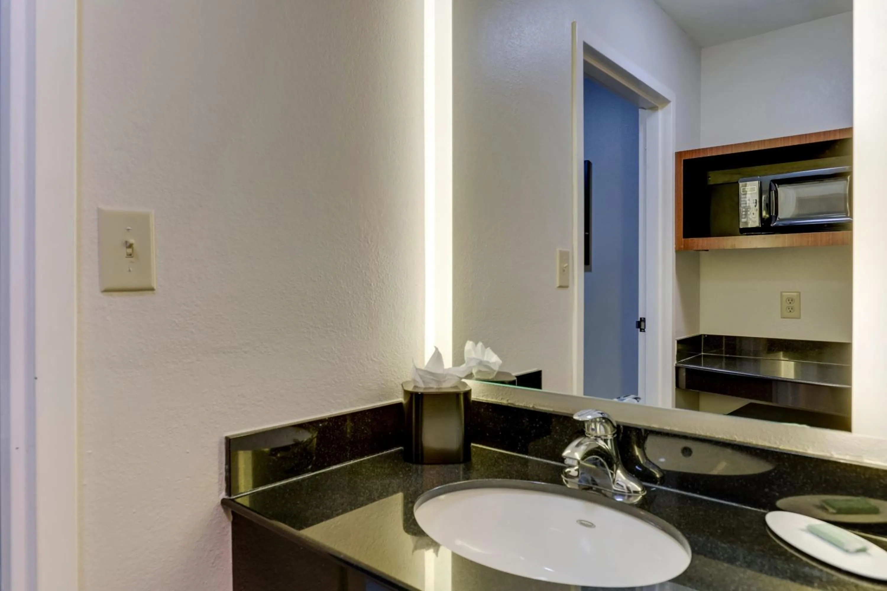 Bathroom in Las Colinas Inn Irving, SureStay Collection by Best Western