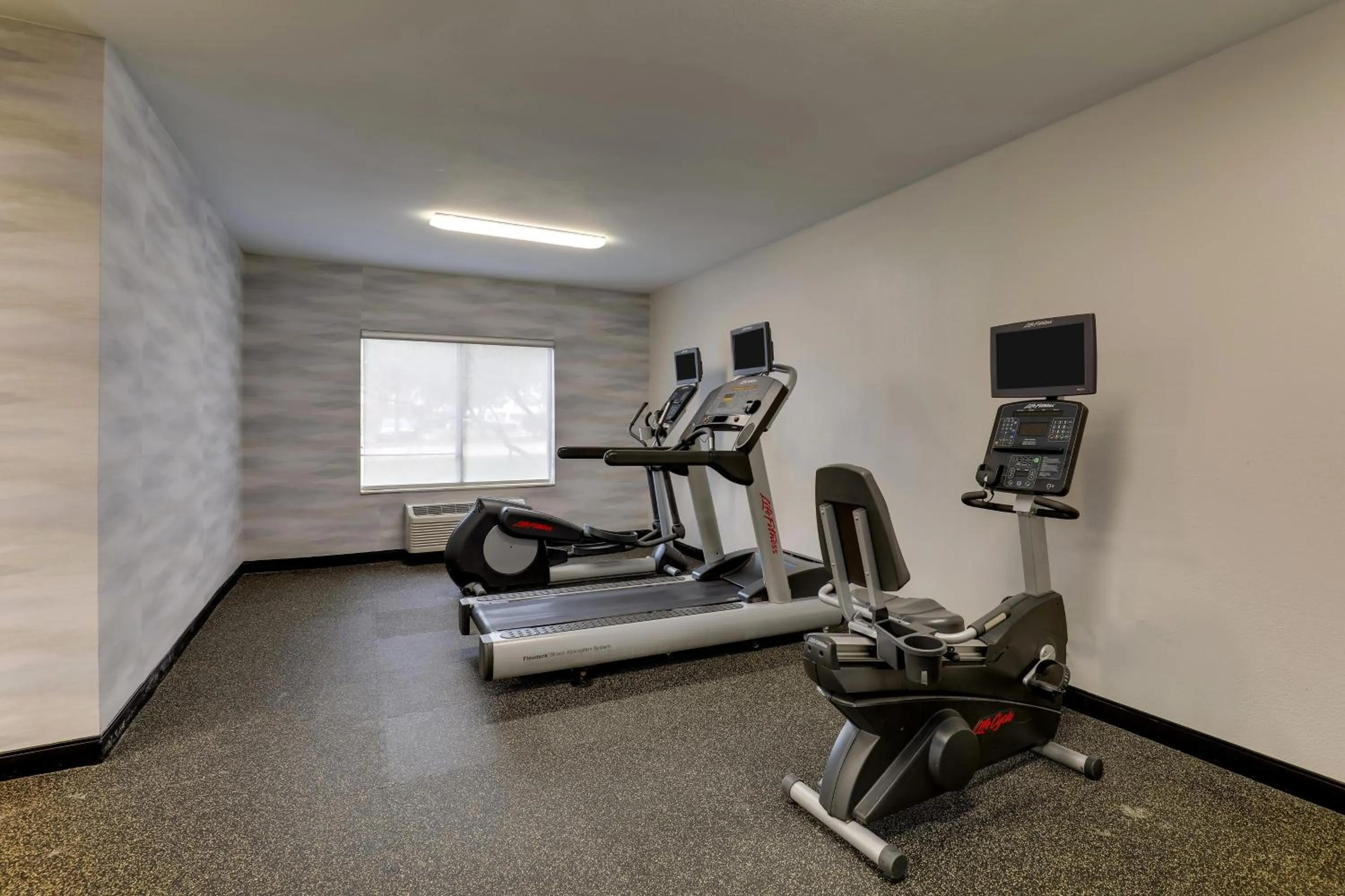Fitness centre/facilities in Las Colinas Inn Irving, SureStay Collection by Best Western