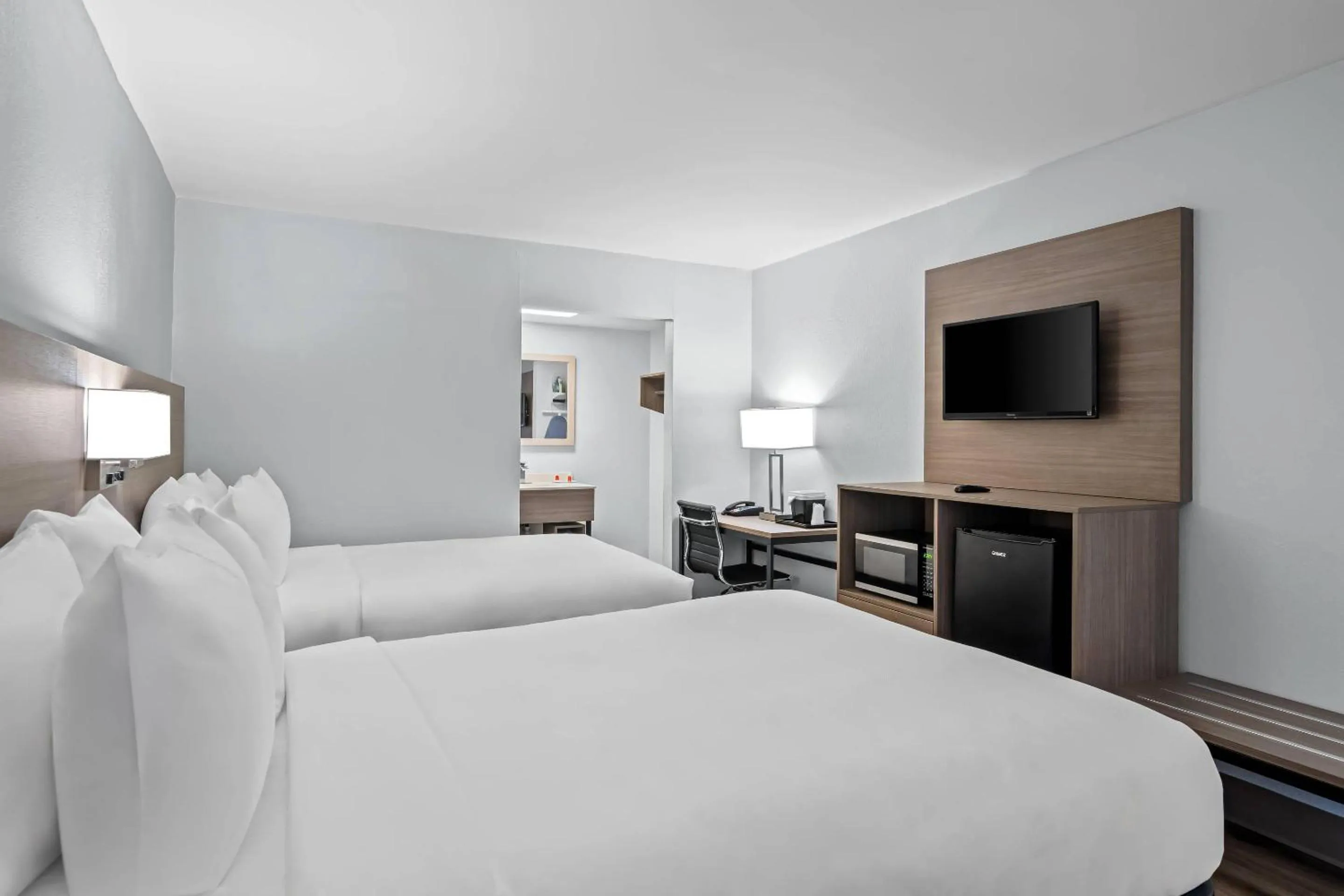 Bedroom, Bed in Econo Lodge Daytona Beach - Speedway