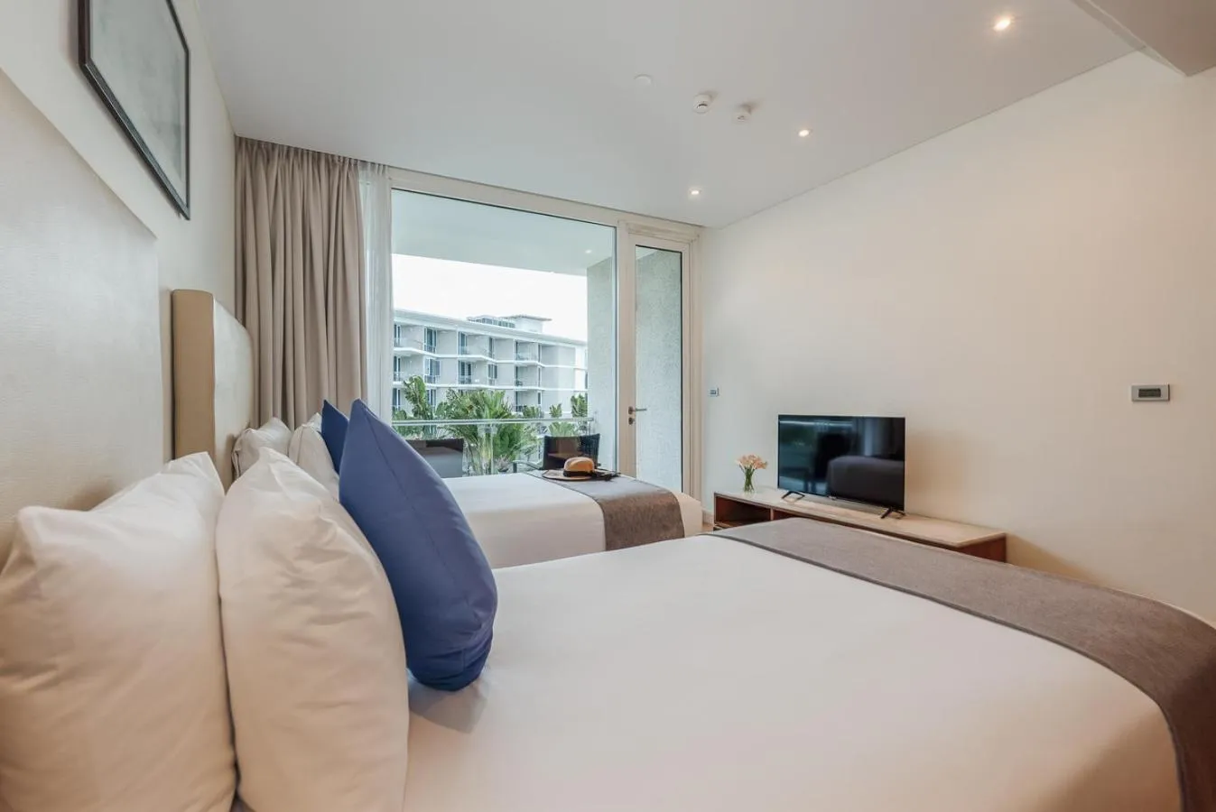 Bed in Splash Beach Resort Phuket Family-Friendly Water Park Resort Near Phuket Airport