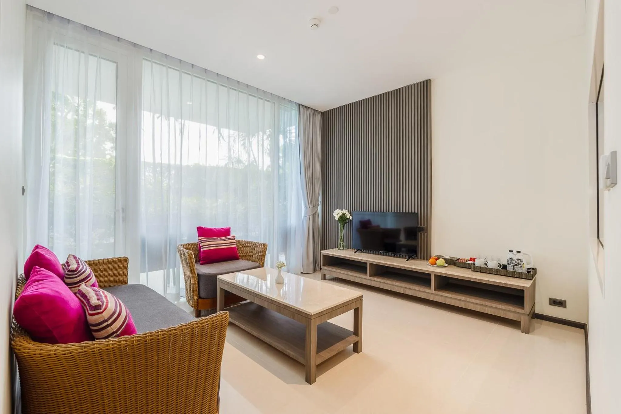 Living room in Splash Beach Resort Phuket Family-Friendly Water Park Resort Near Phuket Airport