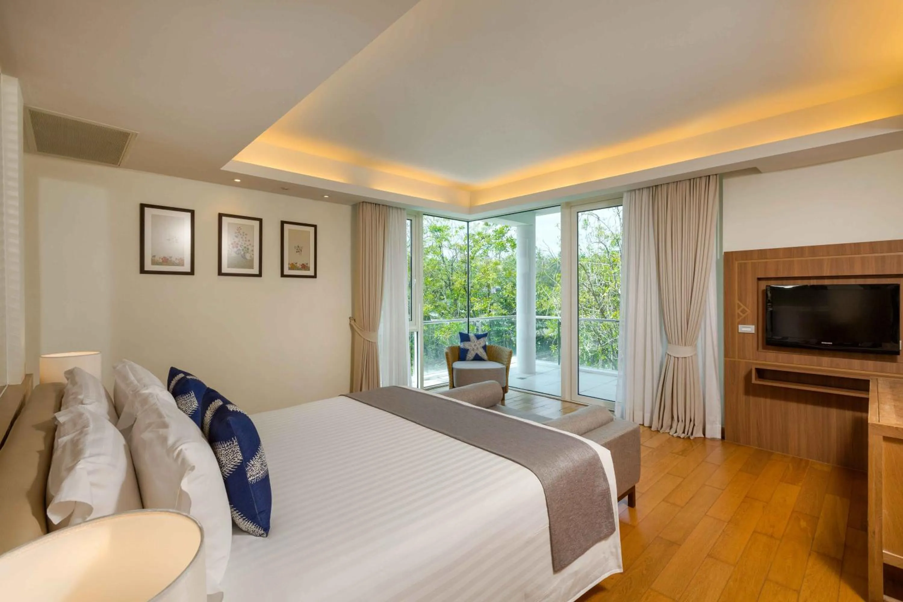 Bed in Splash Beach Resort Phuket, Family-Friendly Beachfront Water Park Resort