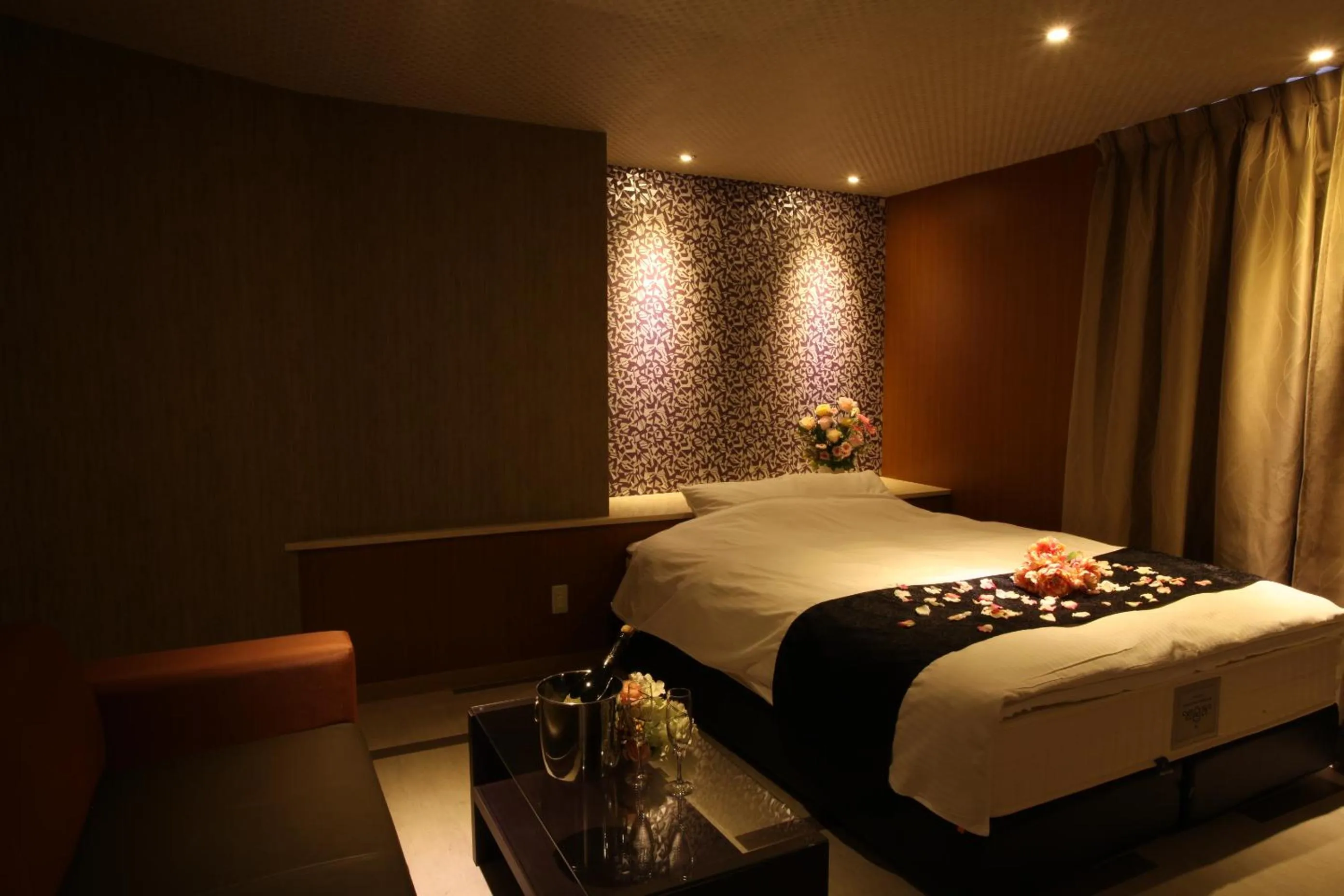 Bed in ホテルオリジン Hotel Origin 男塾ホテルグループ