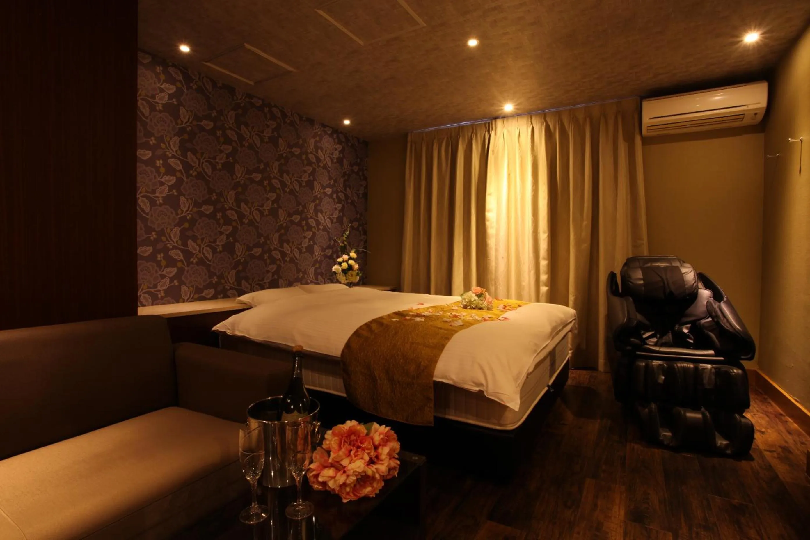 Bed in ホテルオリジン Hotel Origin 男塾ホテルグループ