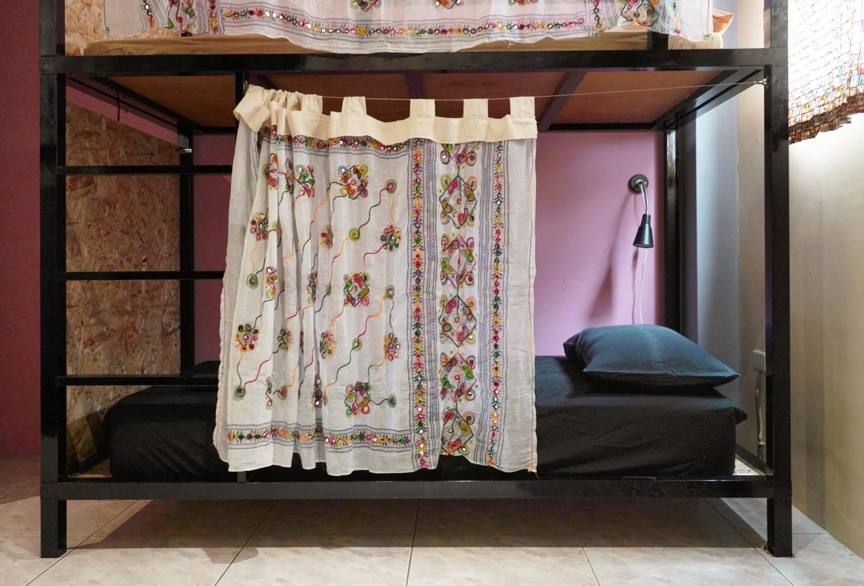 Bed in Dulan The Travel Bug Bistro Inn