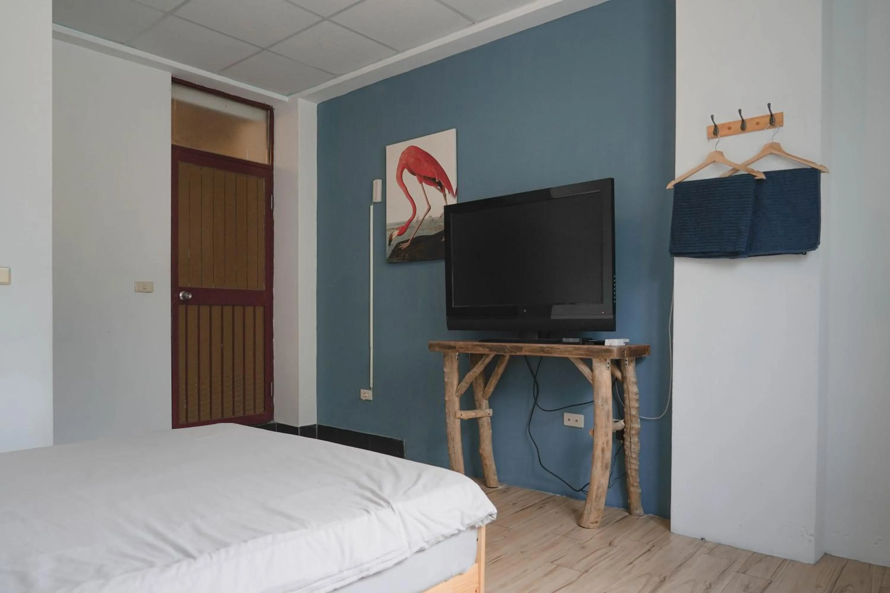 Bed in Dulan The Travel Bug Bistro Inn