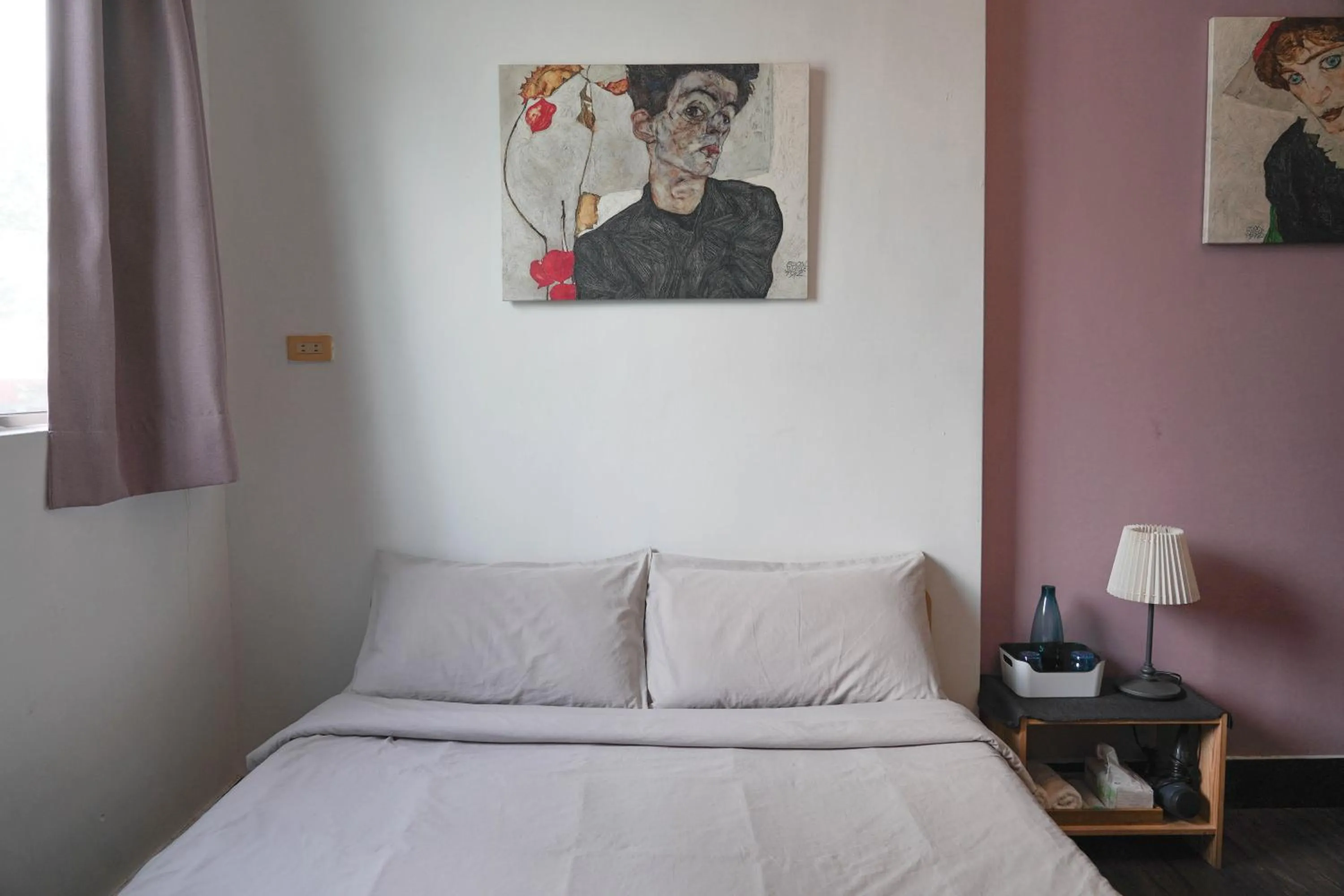 Bed in Dulan The Travel Bug Bistro Inn