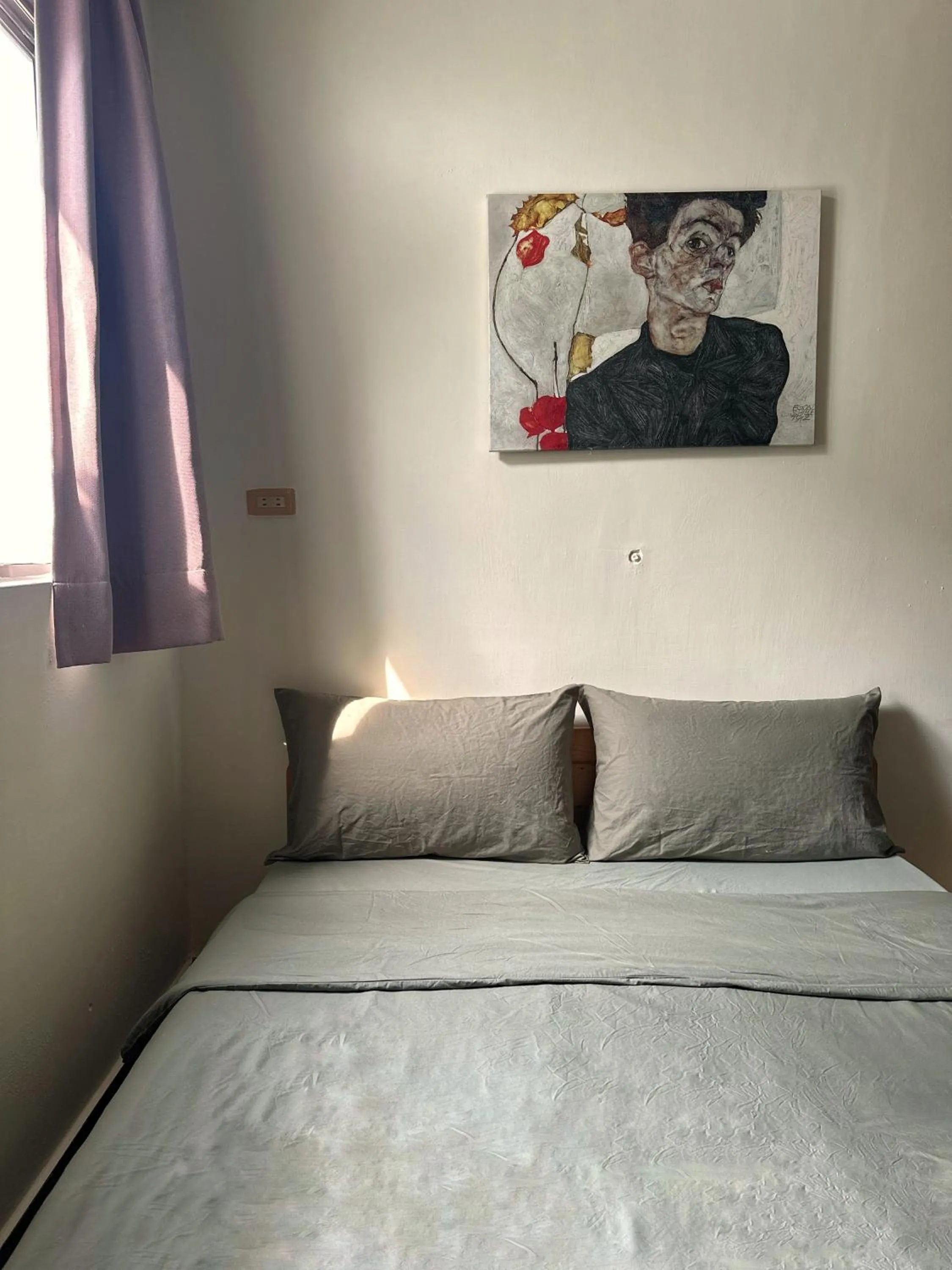 Bed in Dulan The Travel Bug Bistro Inn