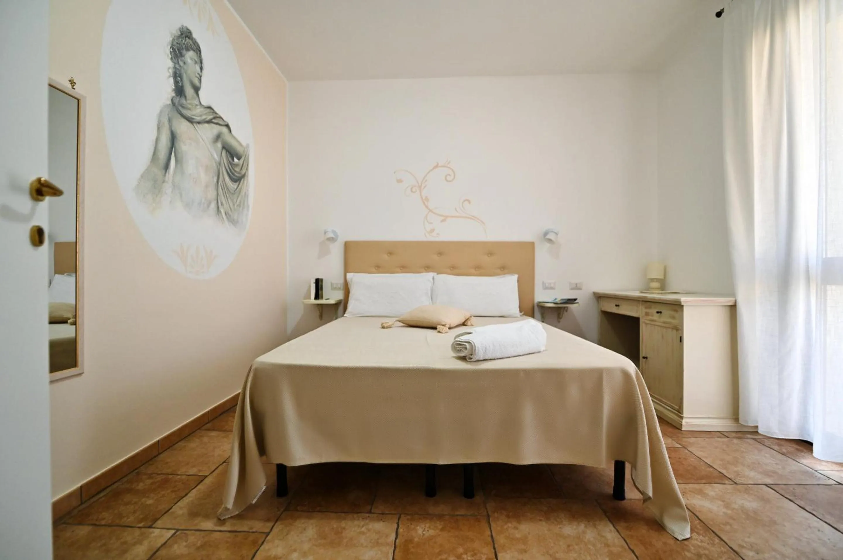 Bedroom in Olimpo B&B