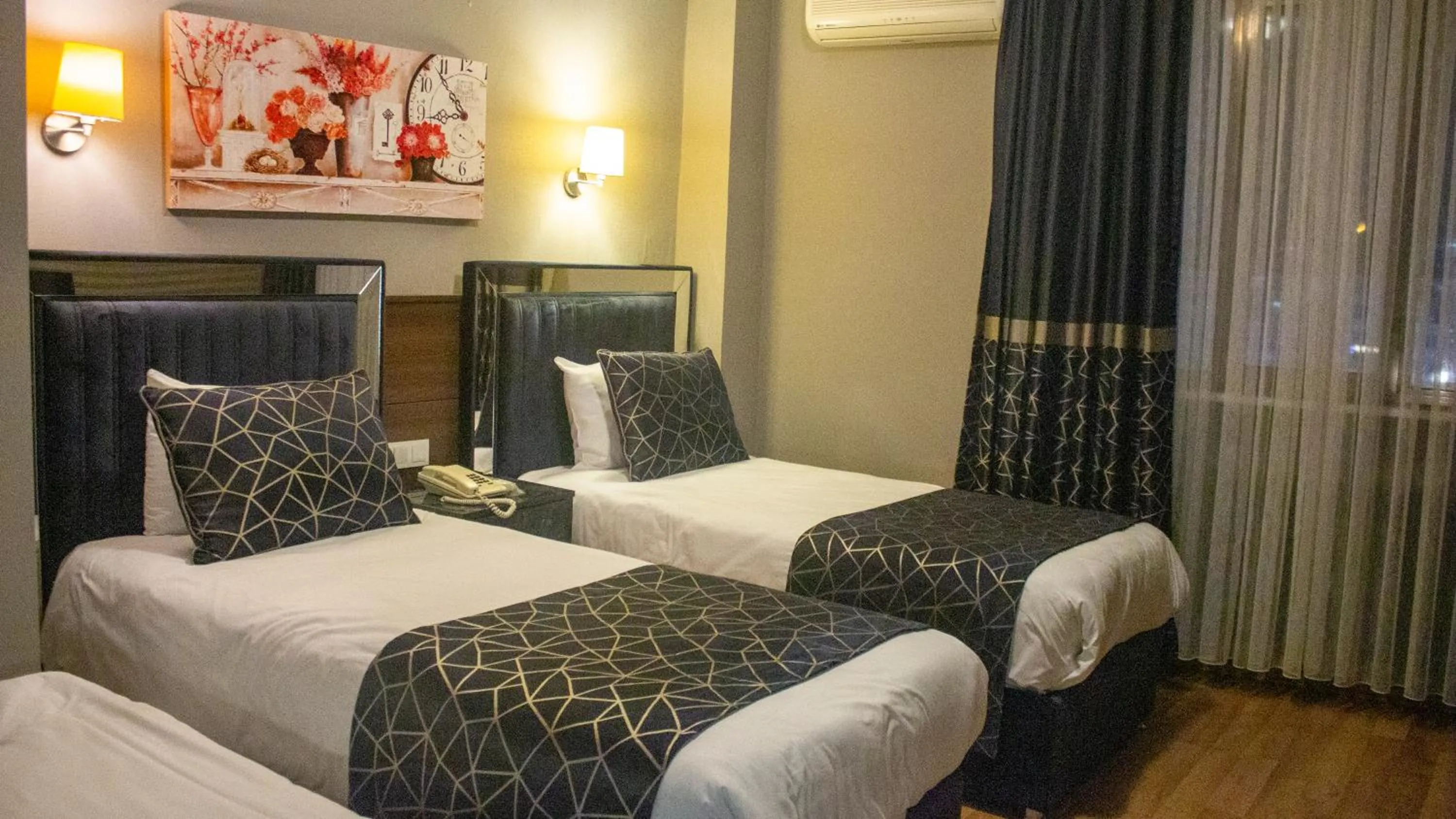 Bed in Star City Hotel