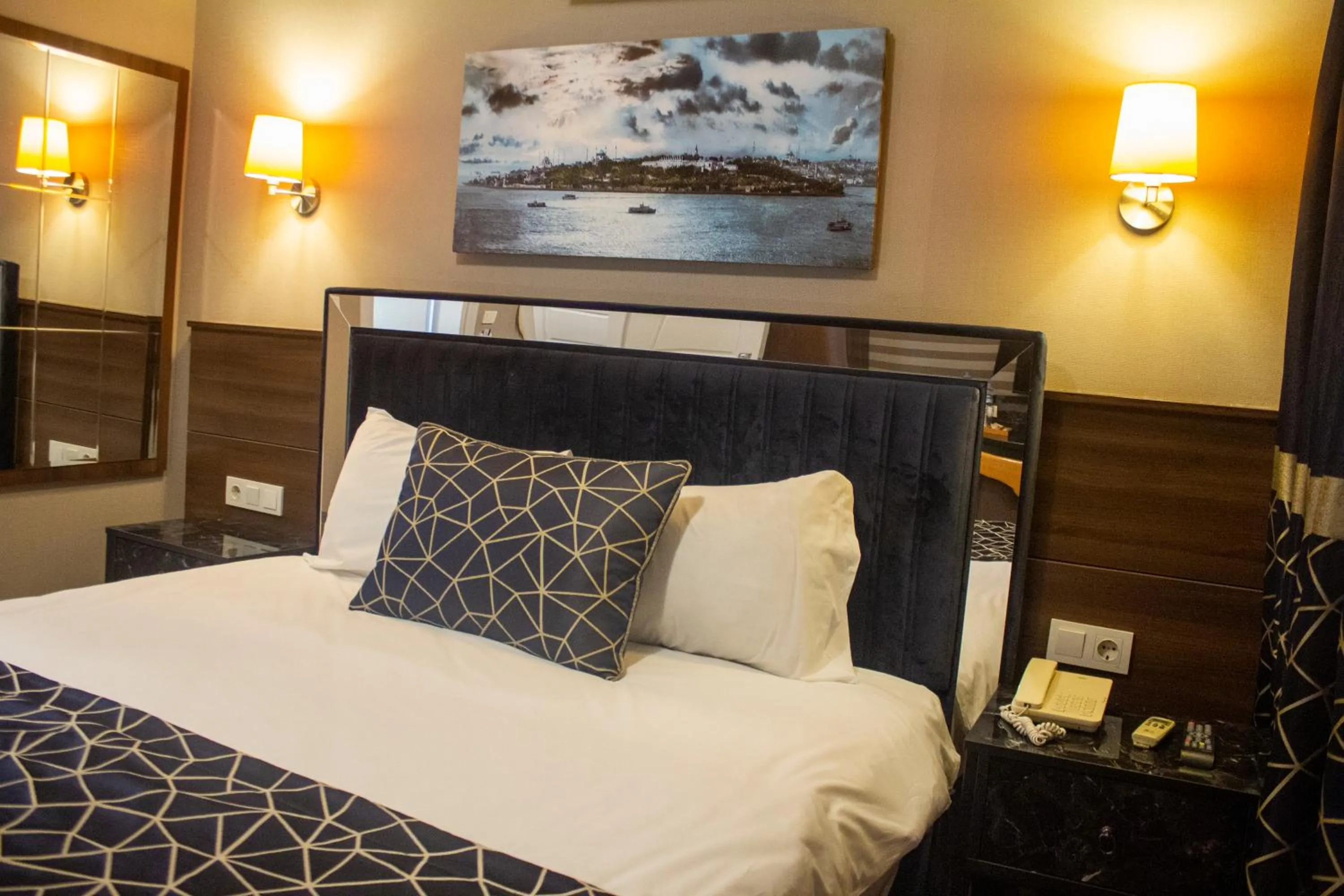 Bed in Star City Hotel