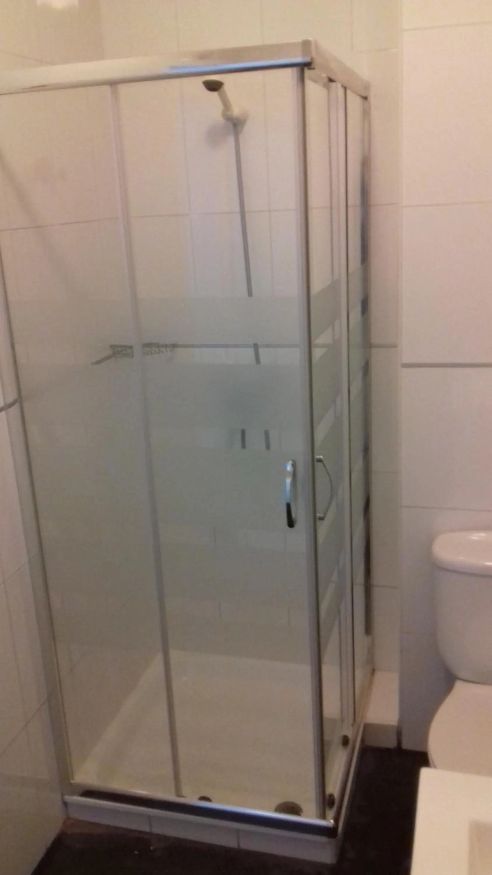 Shower in Apartamentos Turísticos Los Ángeles