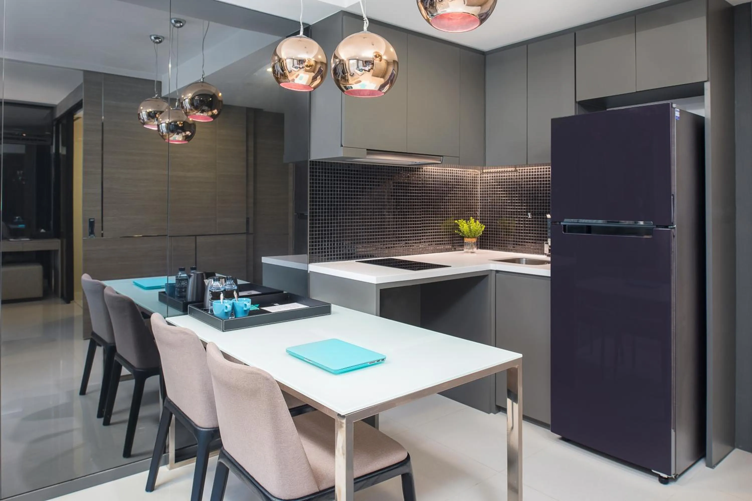 Kitchen or kitchenette in Seaphere Pattaya Hotel by Elite Suites