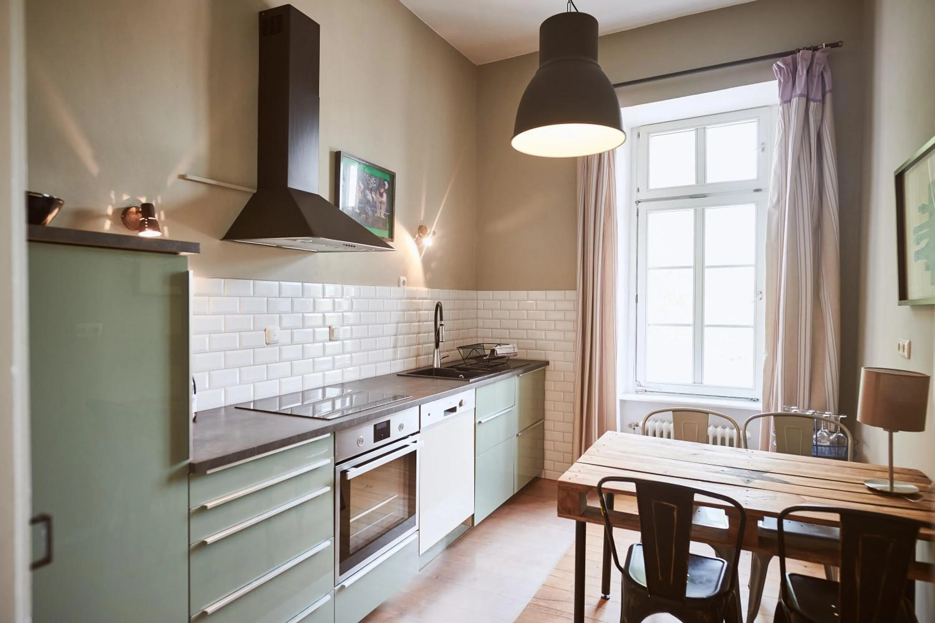 Kitchen or kitchenette in Gutshotel Baron Knyphausen