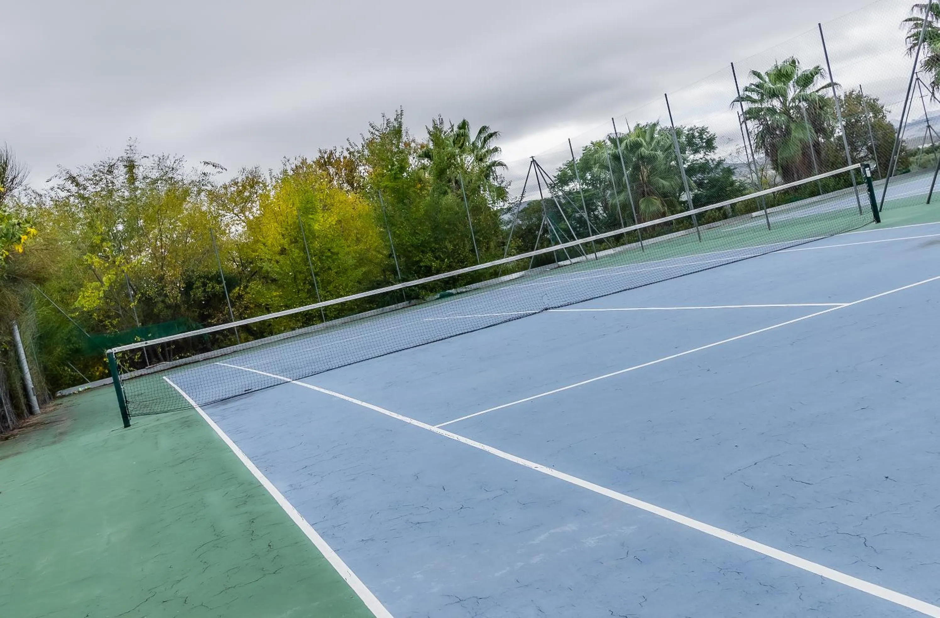 Tennis court in Hotel Las Errizas by Vivere Stays