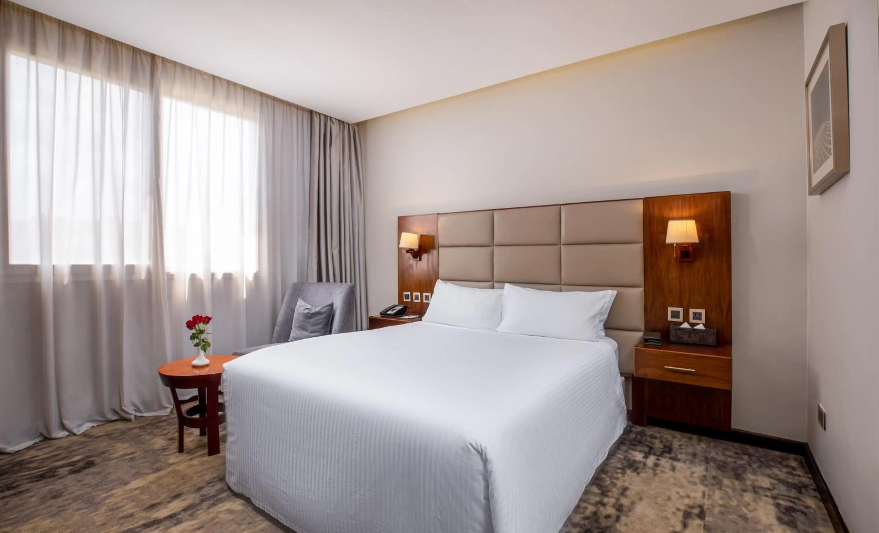 TV and multimedia, Bed in Golden Tulip Canaan Kampala