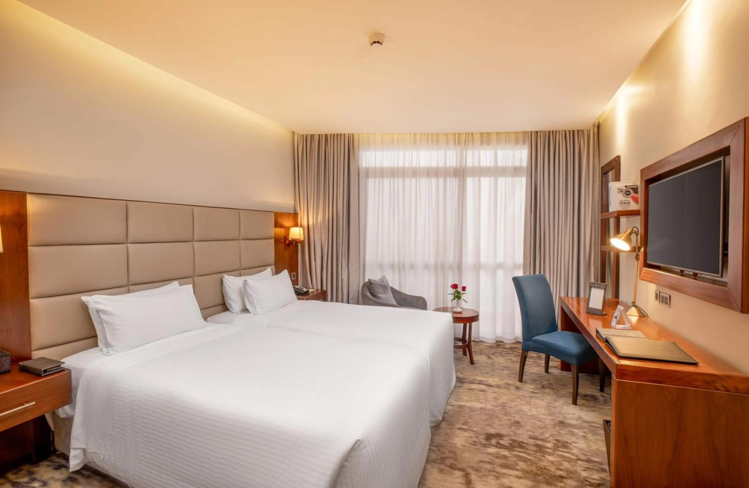 Bed in Golden Tulip Canaan Kampala