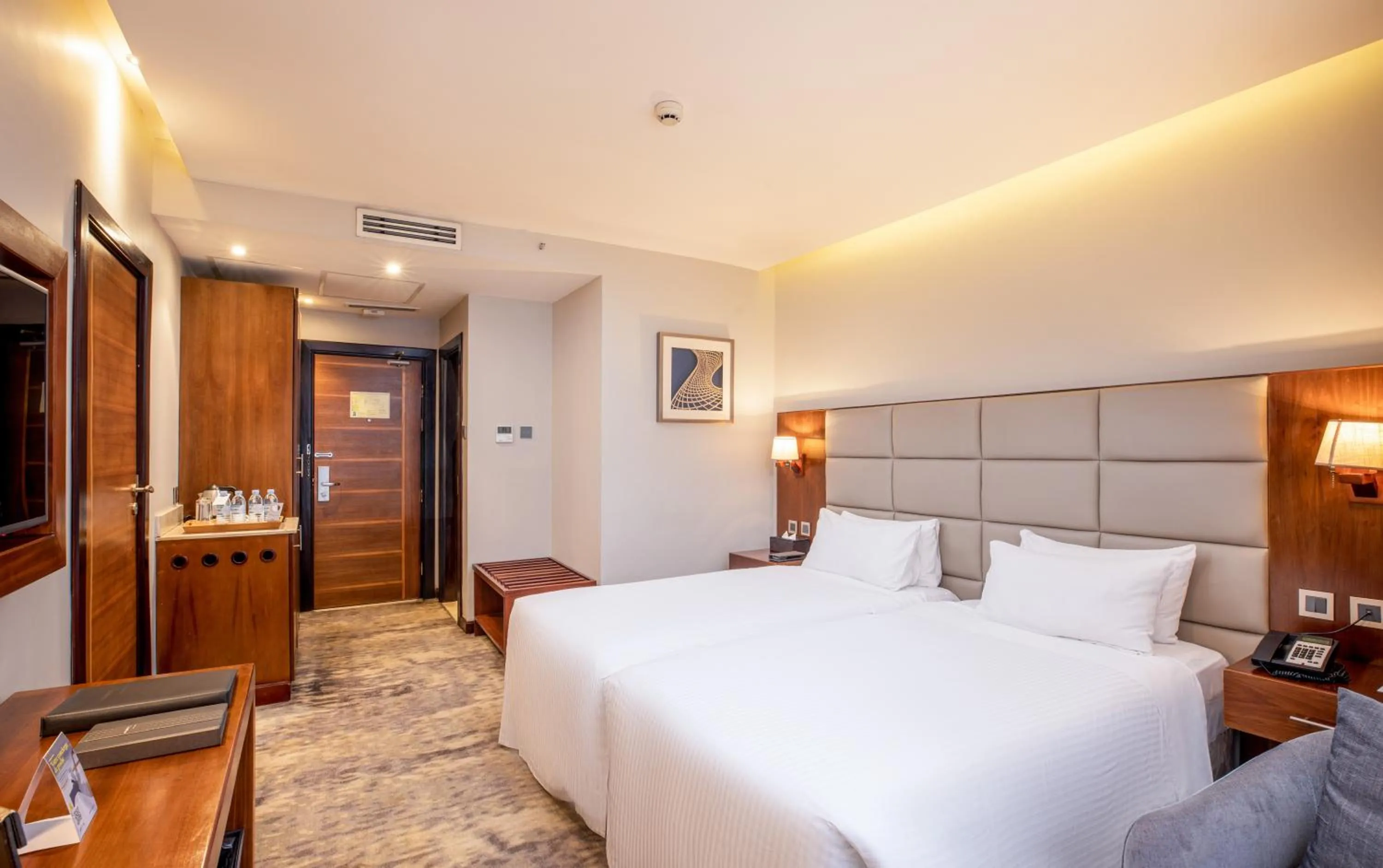 Bed in Golden Tulip Canaan Kampala