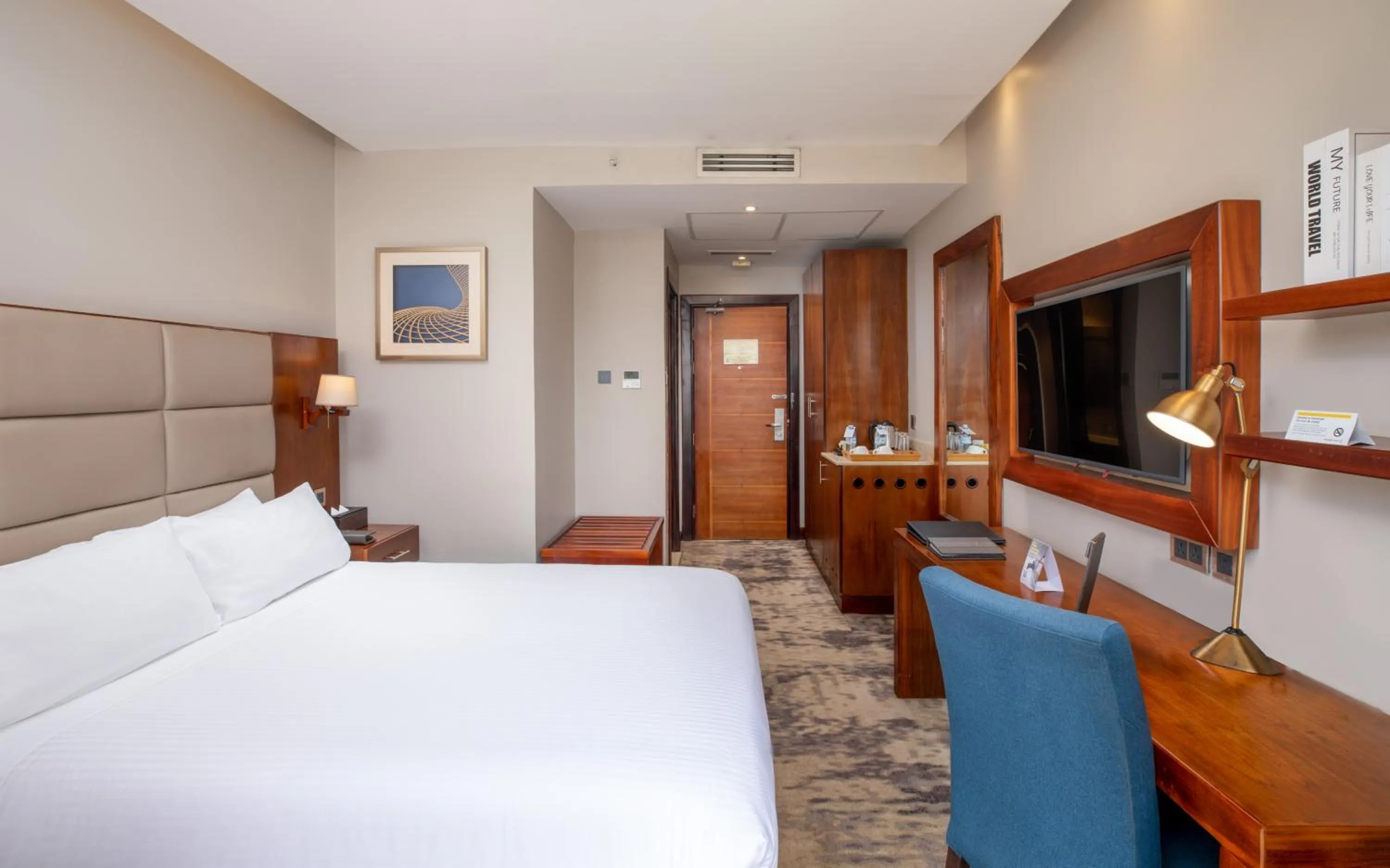 Bed in Golden Tulip Canaan Kampala