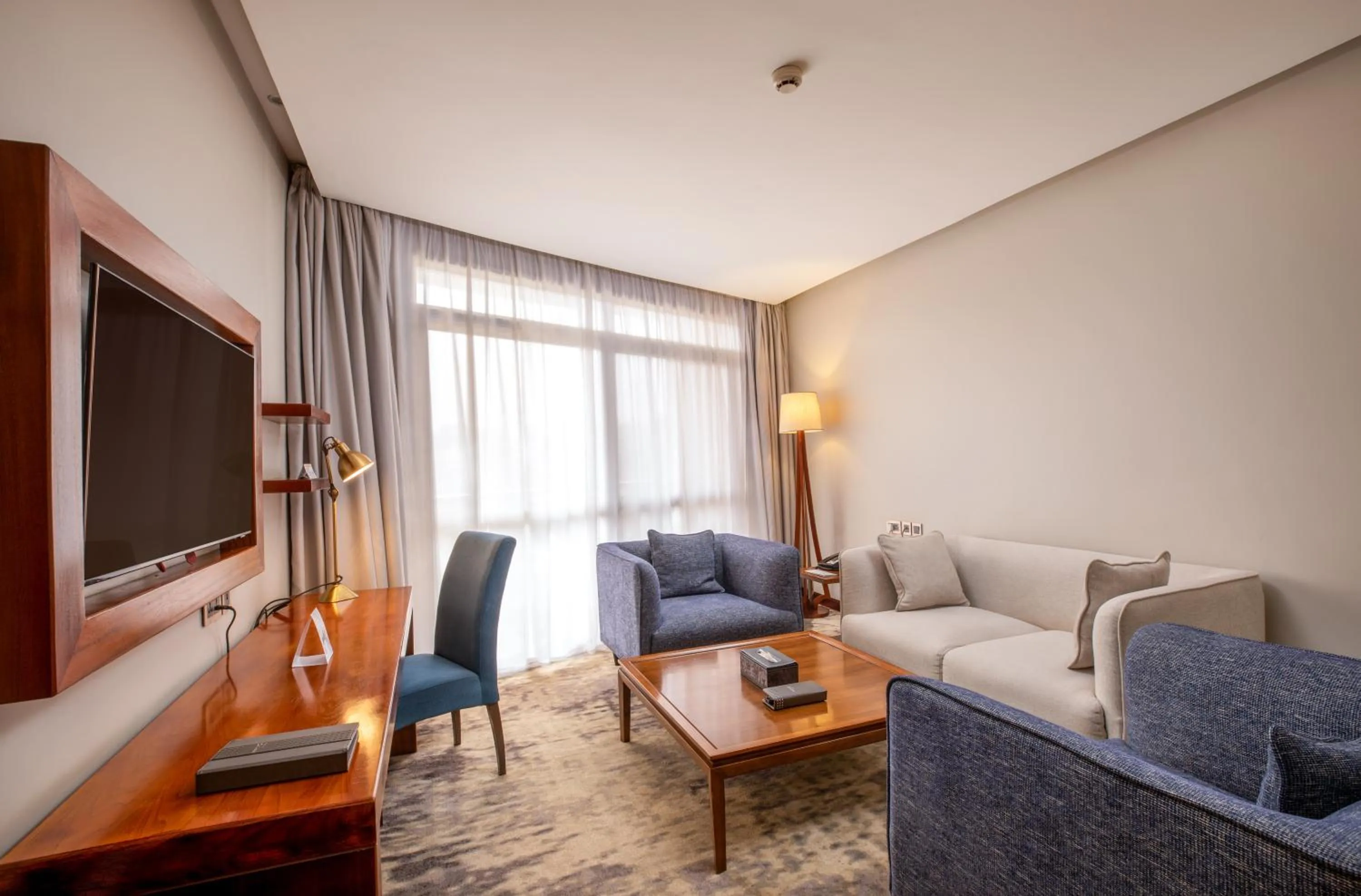 Communal lounge/ TV room in Golden Tulip Canaan Kampala