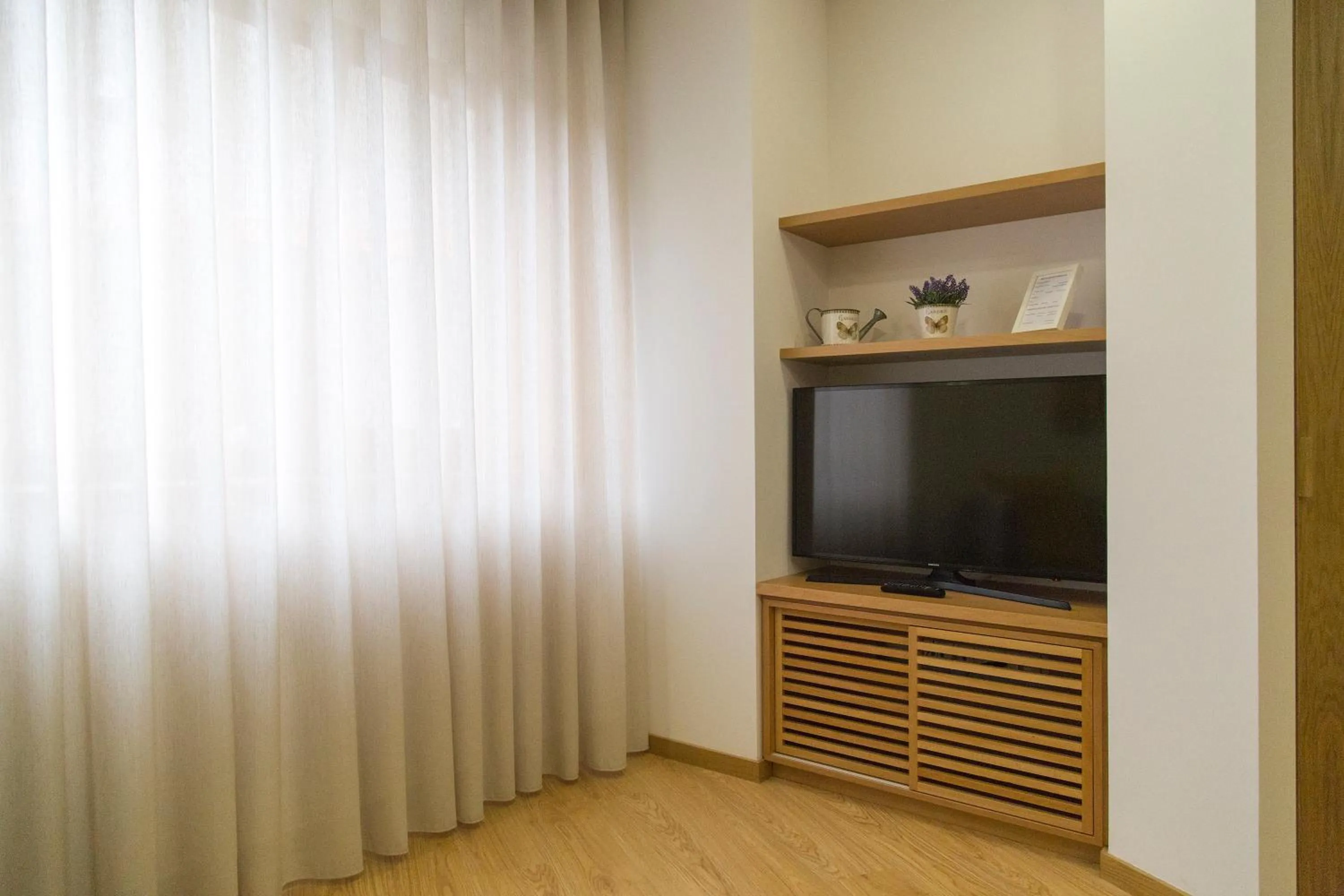 TV and multimedia in Spot Apartments Trindade