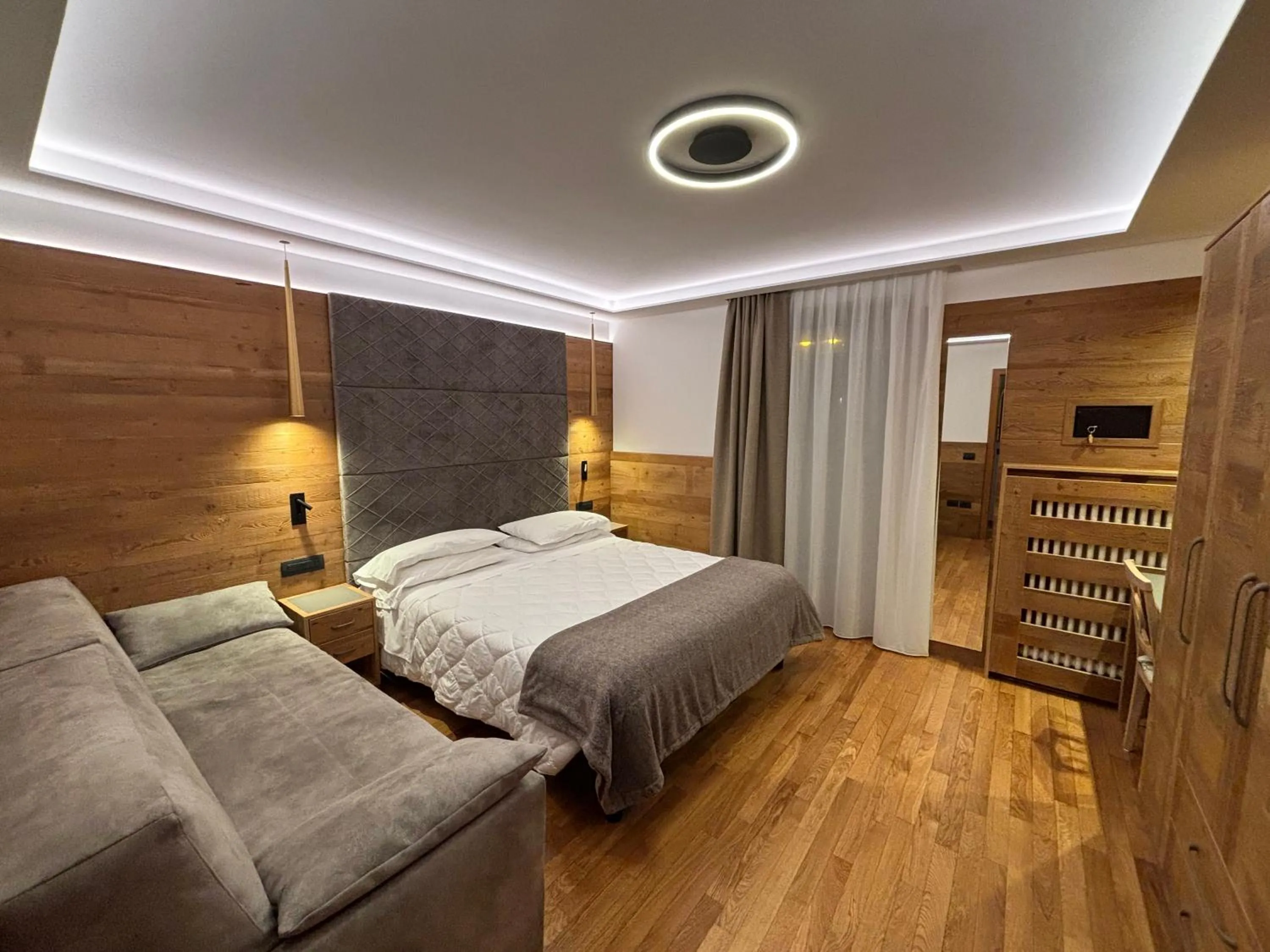 Bed in Alexander Hotel Alpine Wellness Dolomites