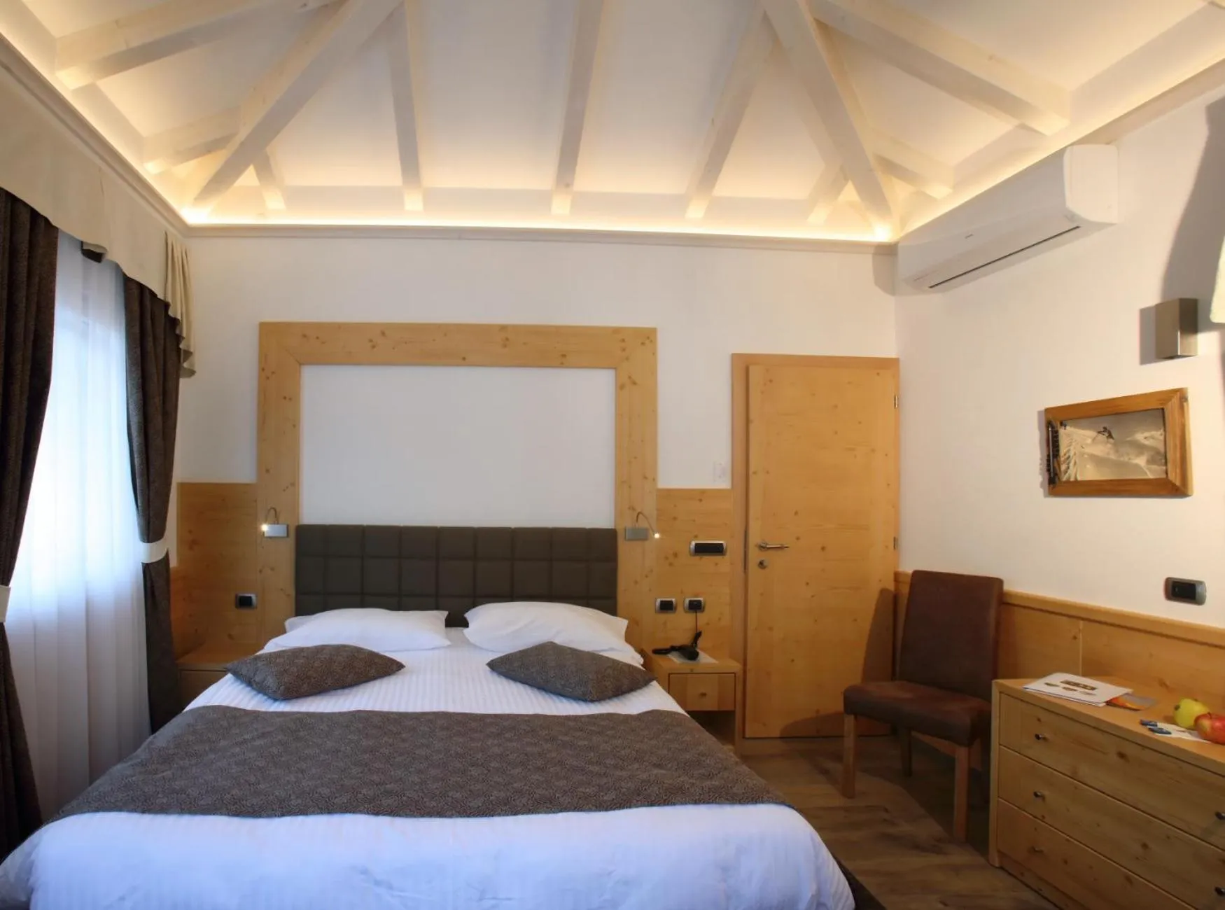 Bed in Alexander Hotel Alpine Wellness Dolomites