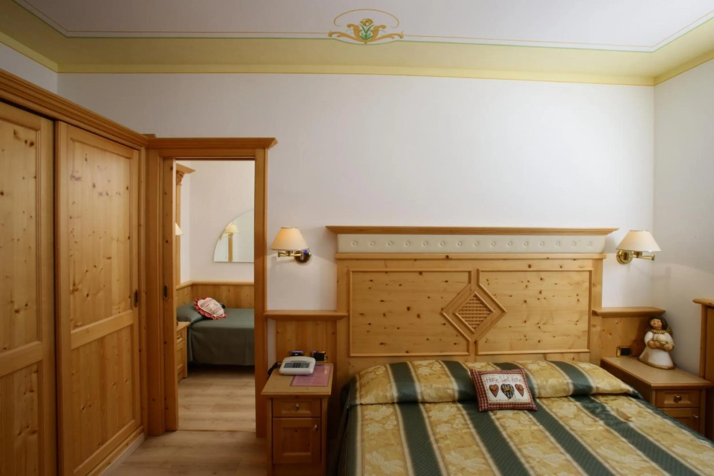 Photo of the whole room, Bed in Alexander Hotel Alpine Wellness Dolomites