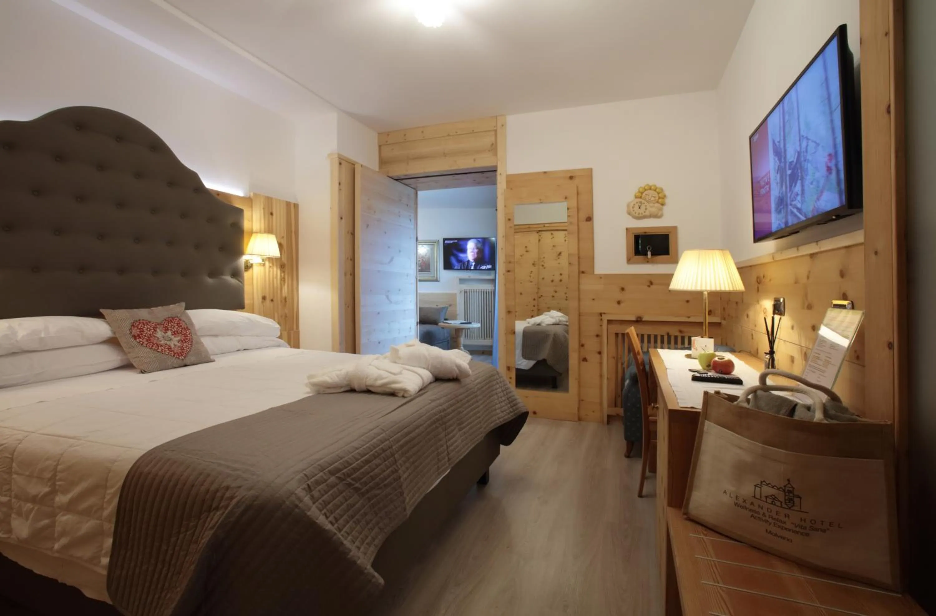 Bedroom, Bed in Alexander Hotel Alpine Wellness Dolomites