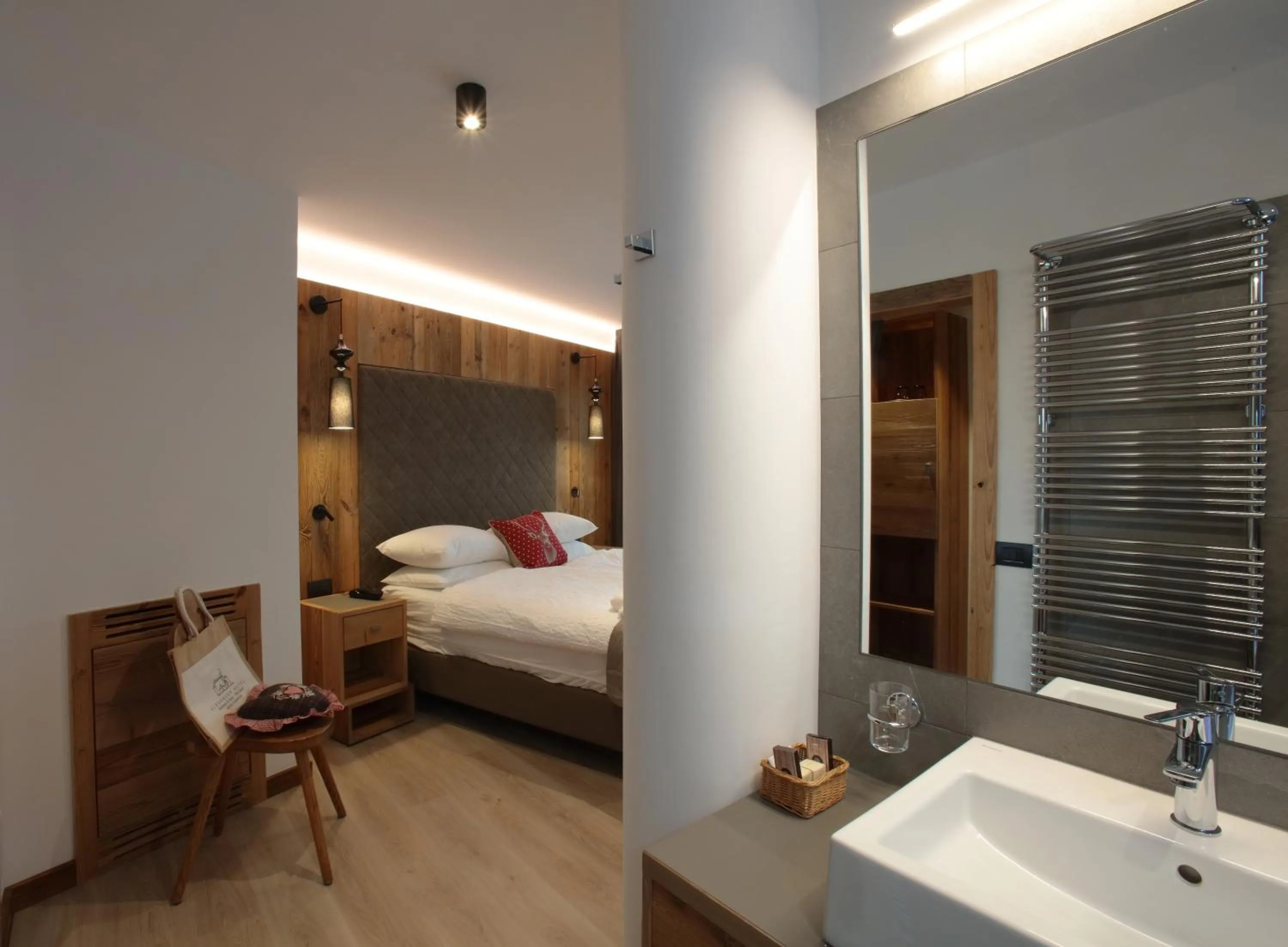 Photo of the whole room, Bed in Alexander Hotel Alpine Wellness Dolomites