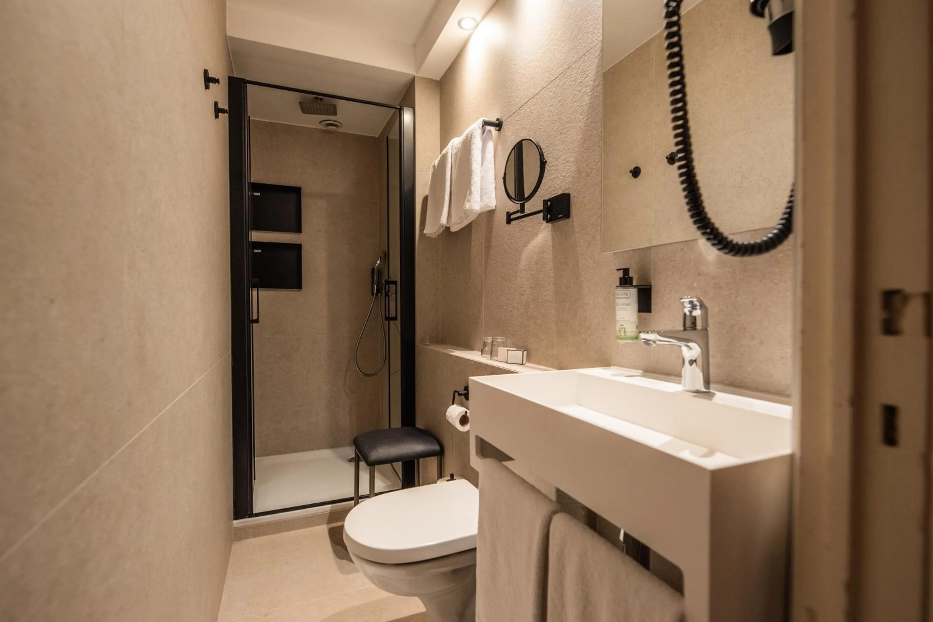 Bathroom in Hostellerie La Claire Fontaine, Logis hôtels & Spa