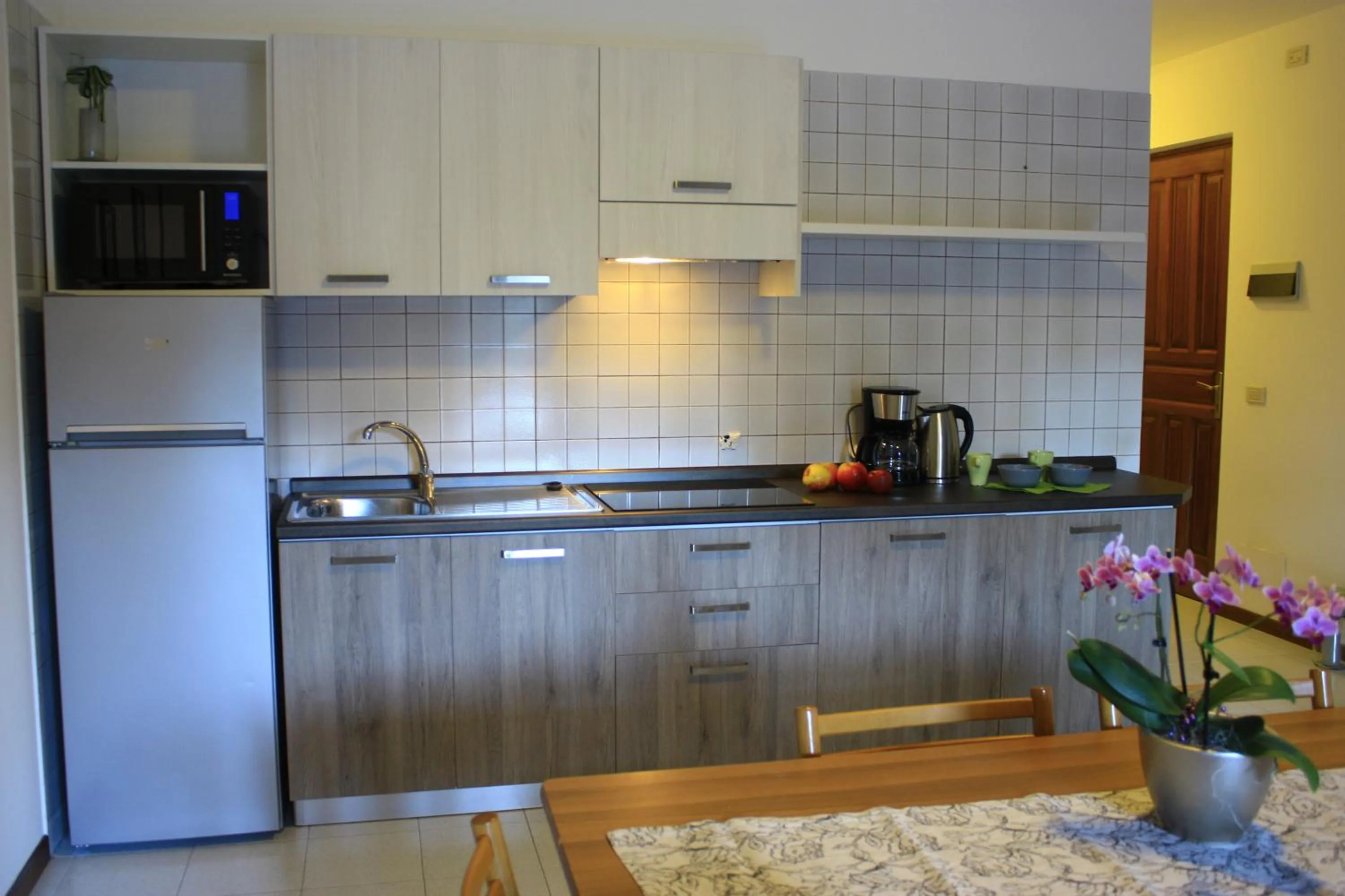 Kitchen or kitchenette in 3MÙZEN apartments