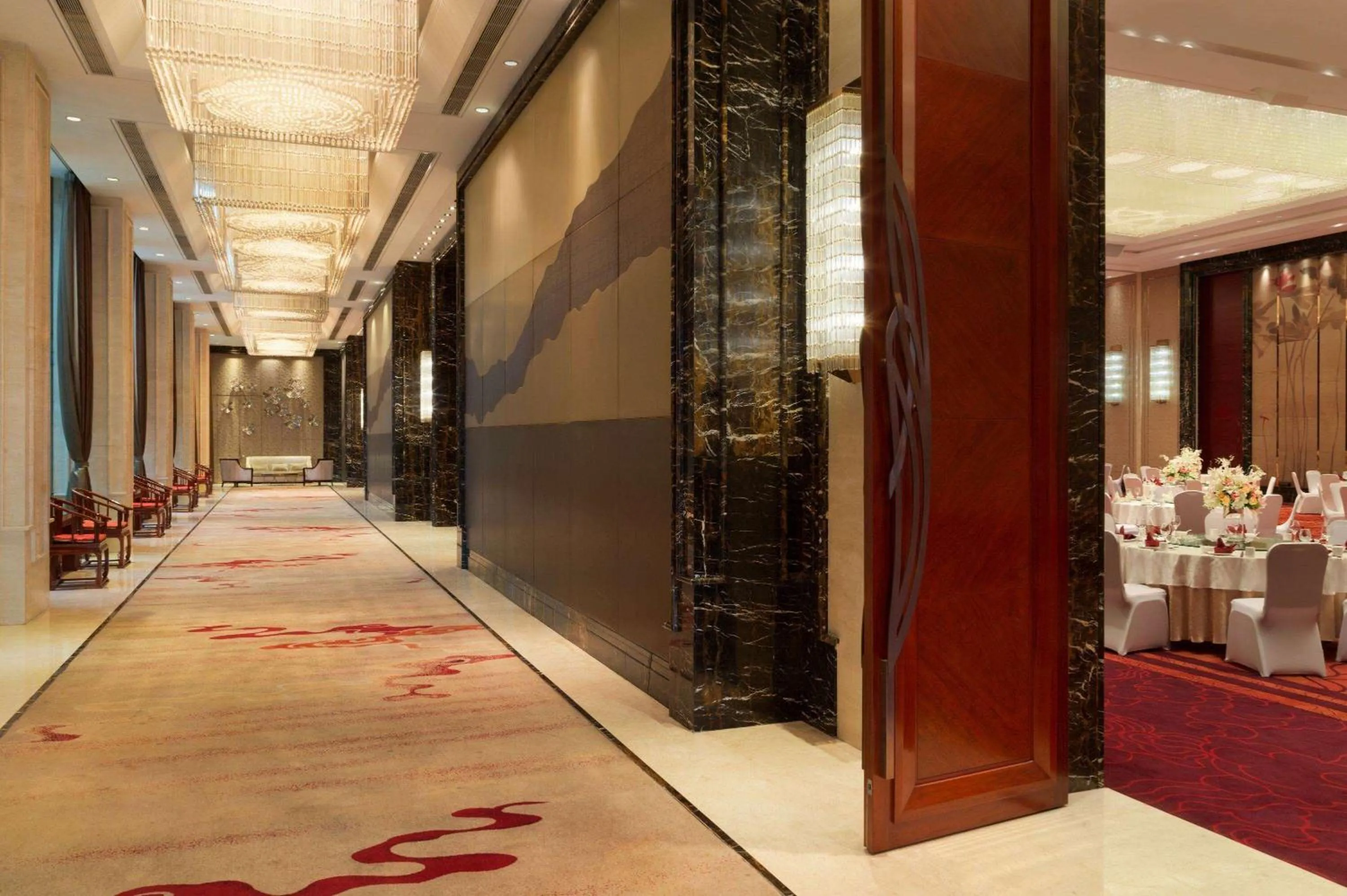 Banquet/Function facilities in Wyndham Qingdao l Free Fixed-Time Shuttle Service Between Hotel and Airport & North Railway Station l Outdoor Children's Amusement Park l 1-Hour Play Snooker or Table Tennis