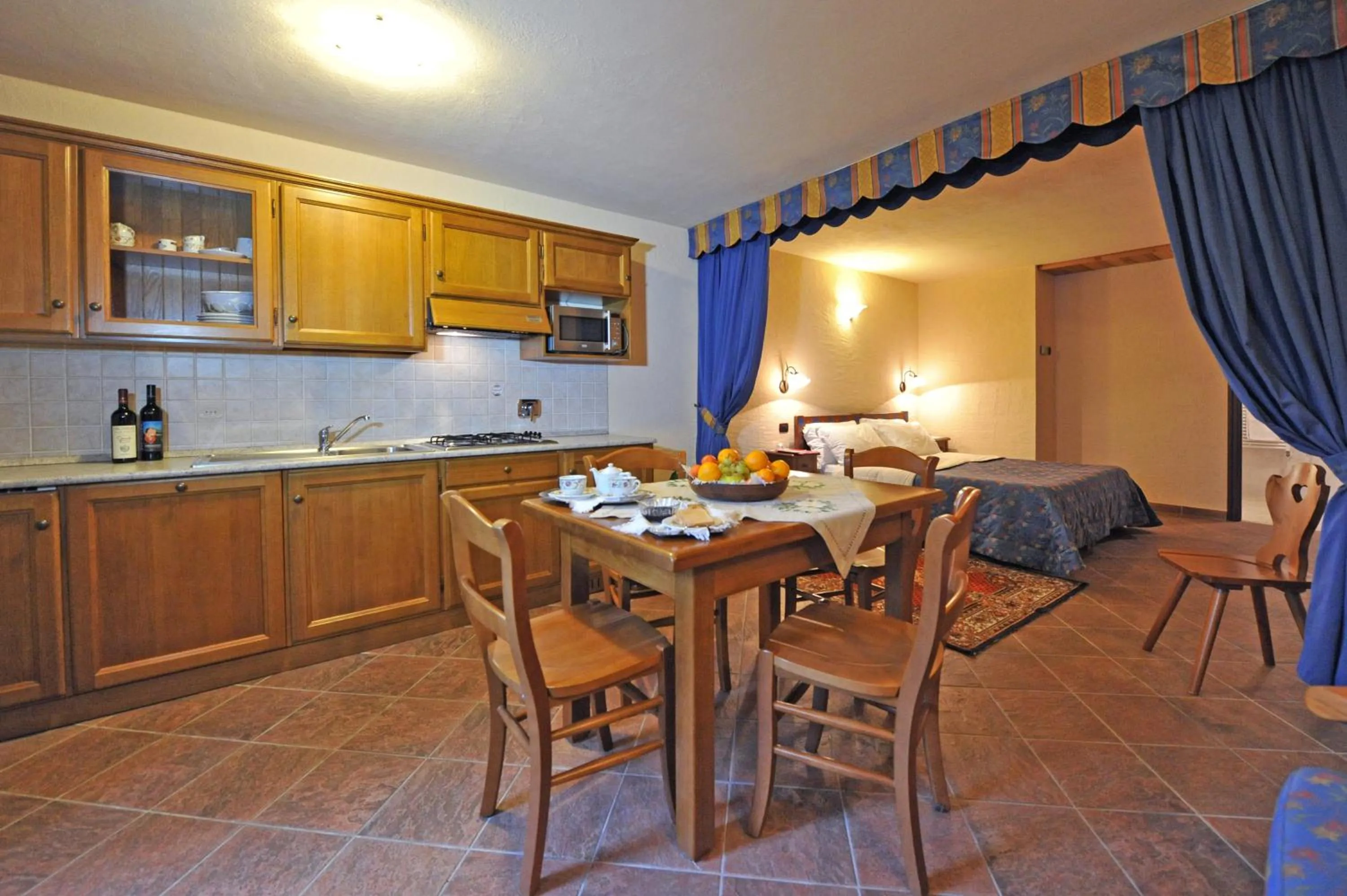 Kitchen or kitchenette in Family Apartments Le Chalet