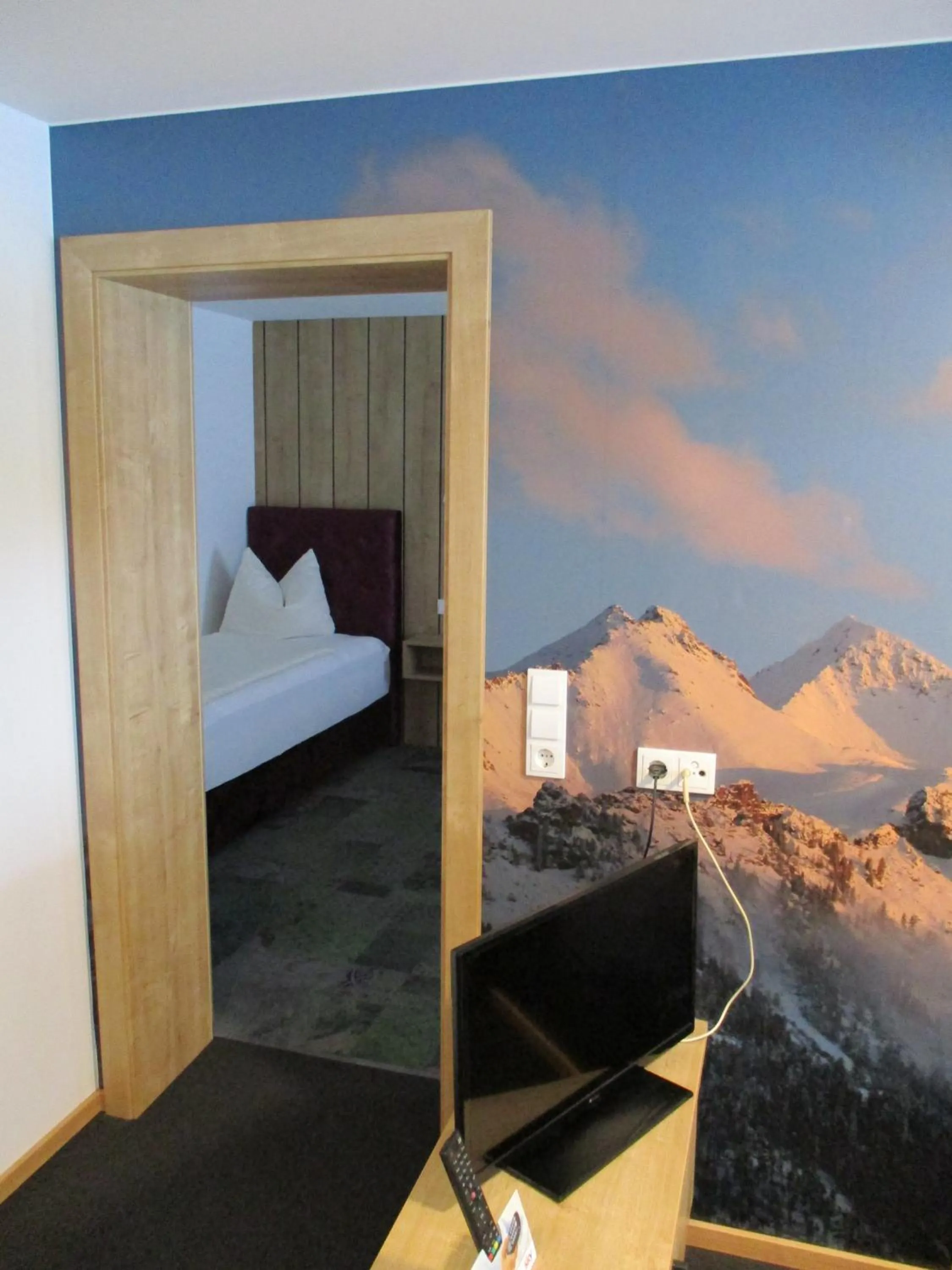 Bed in Aparthotel Garni Schranz
