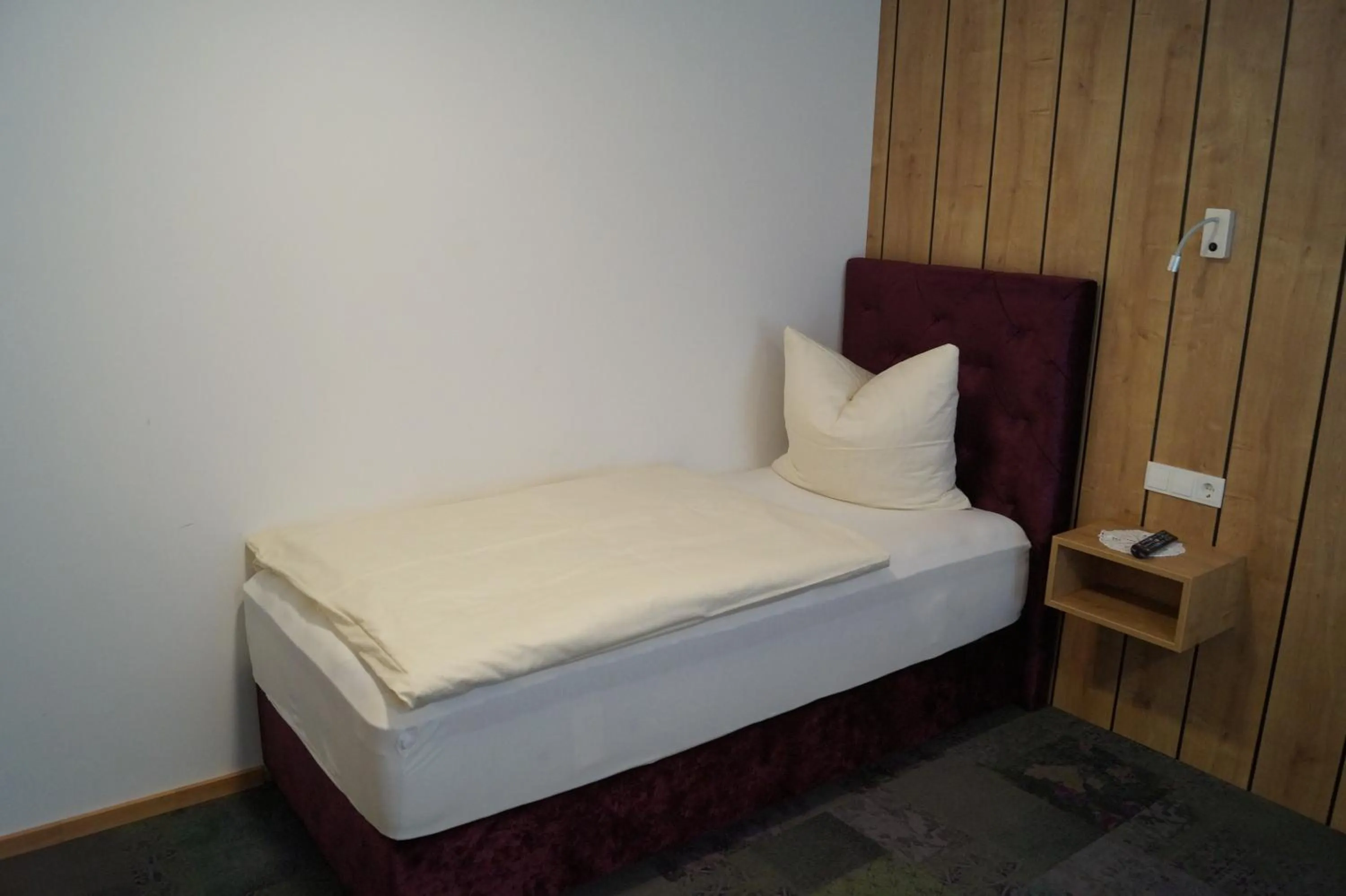 Bed in Aparthotel Garni Schranz