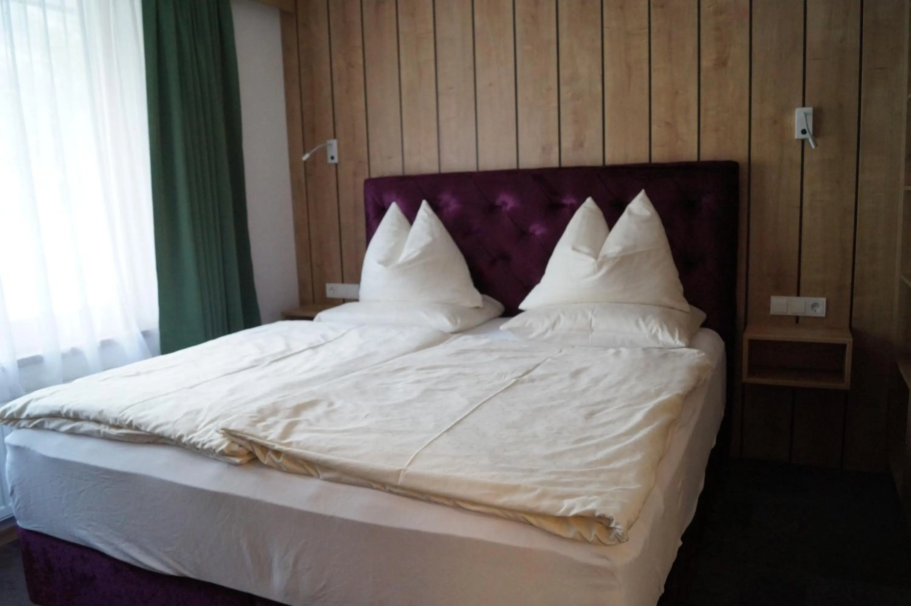 Bed in Aparthotel Garni Schranz