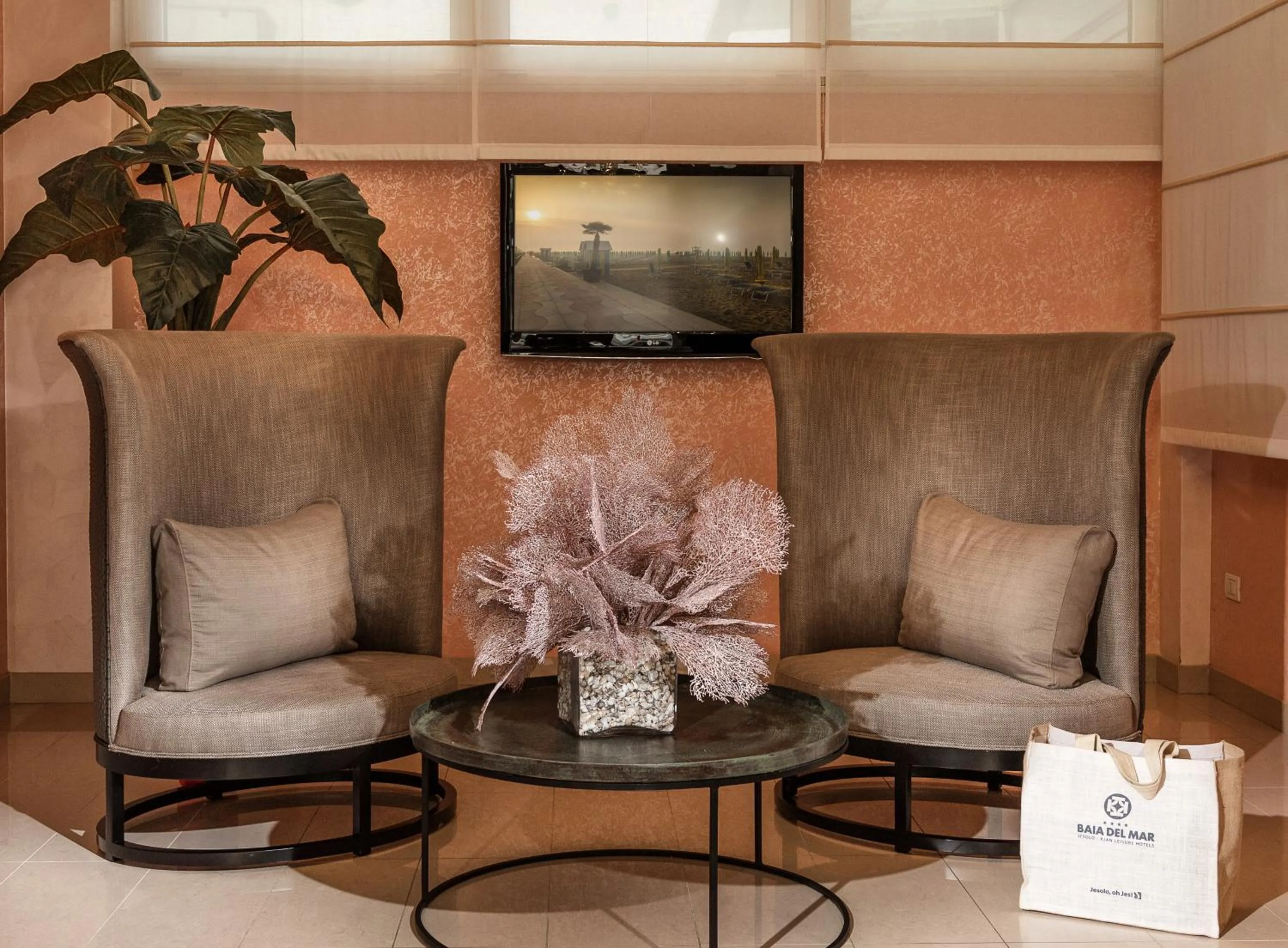 Communal lounge/ TV room in Baia del Mar Beach Boutique Hotel