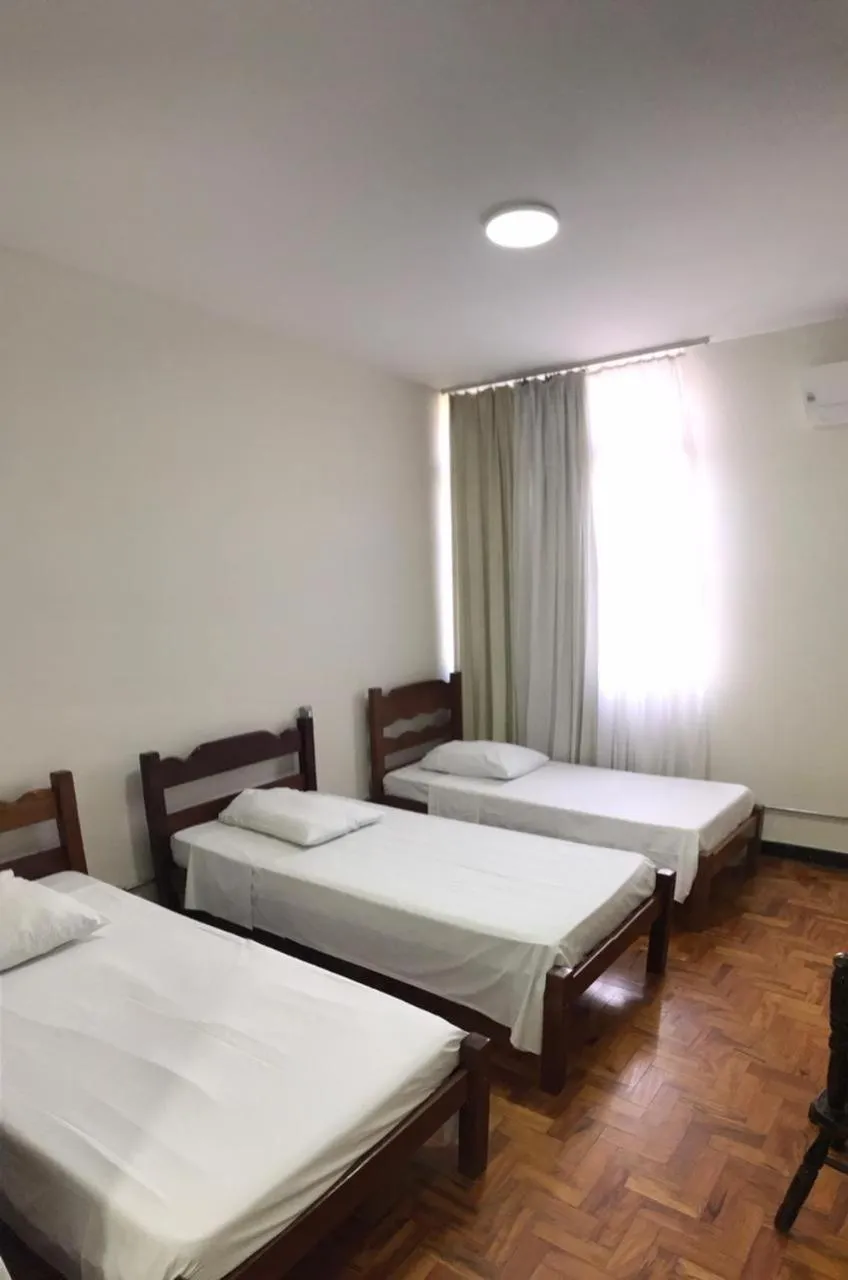 Bed in Hotel Sao Nicolau