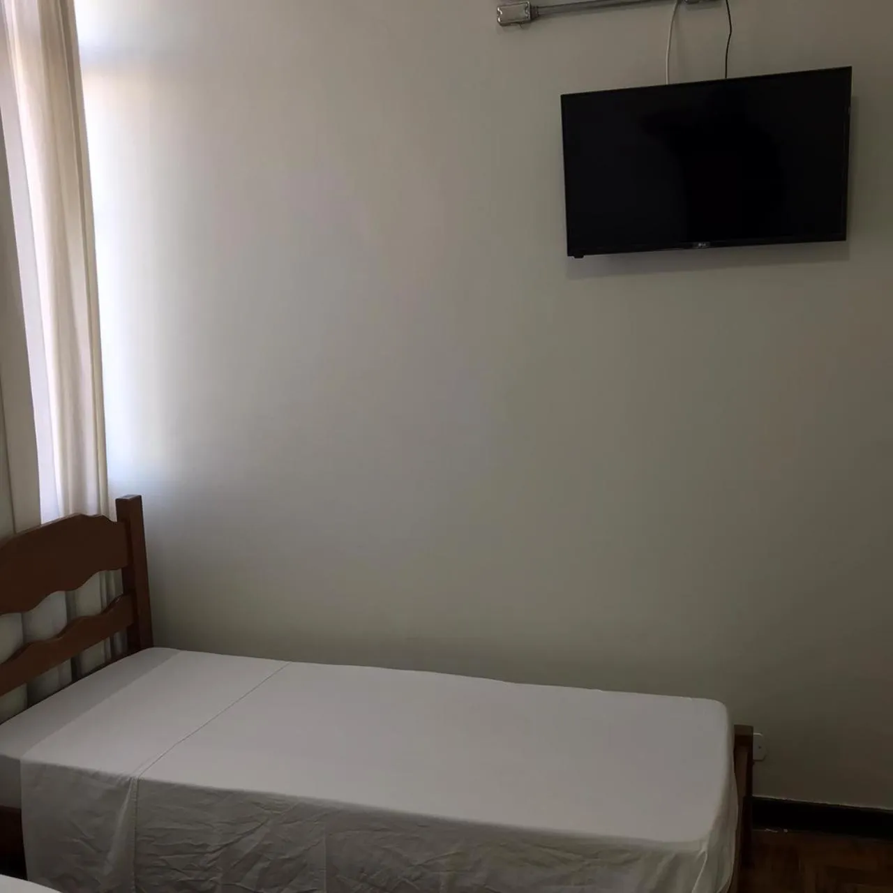 Bed in Hotel Sao Nicolau