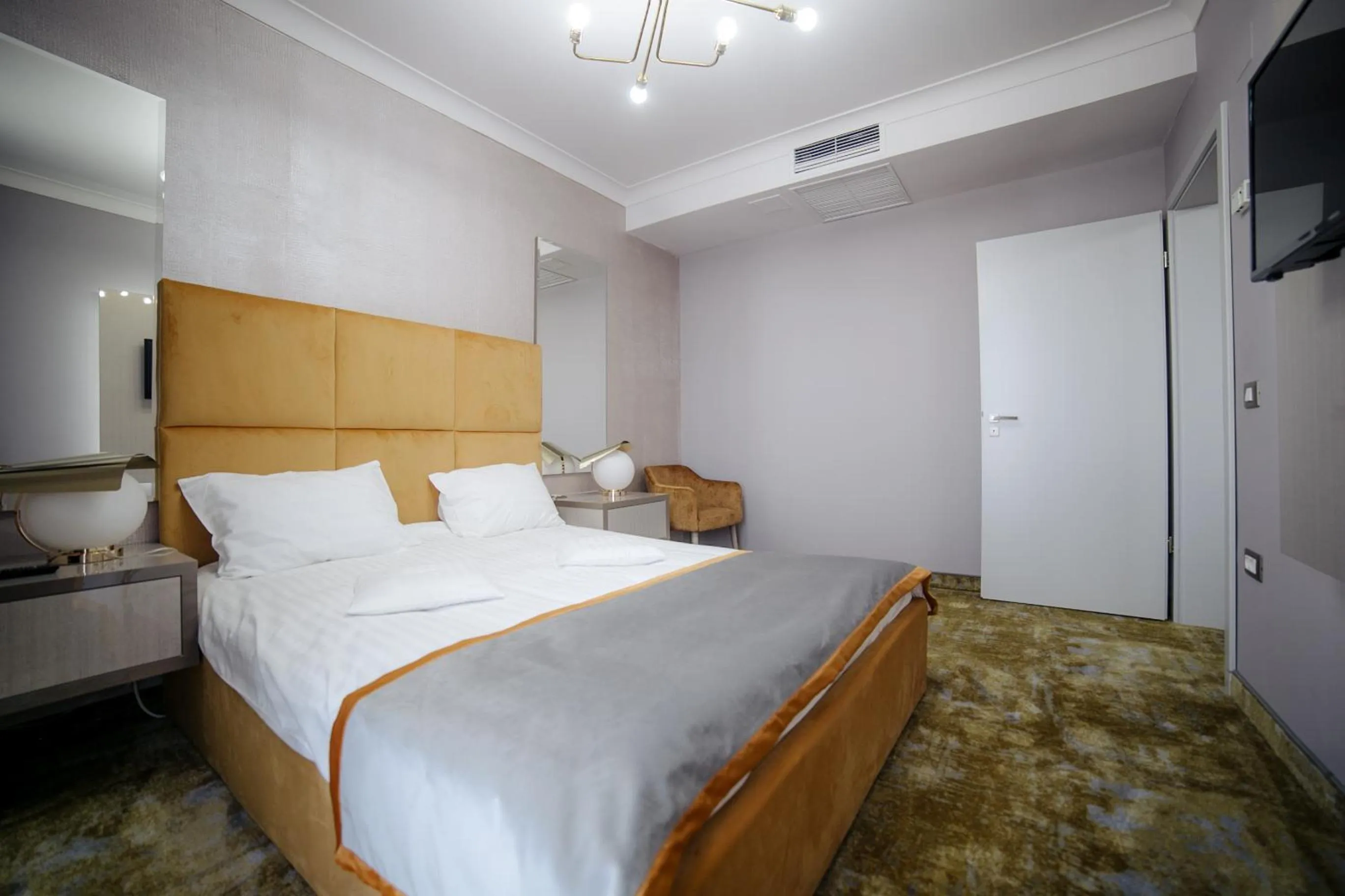 Bed in Royal Class Hotel