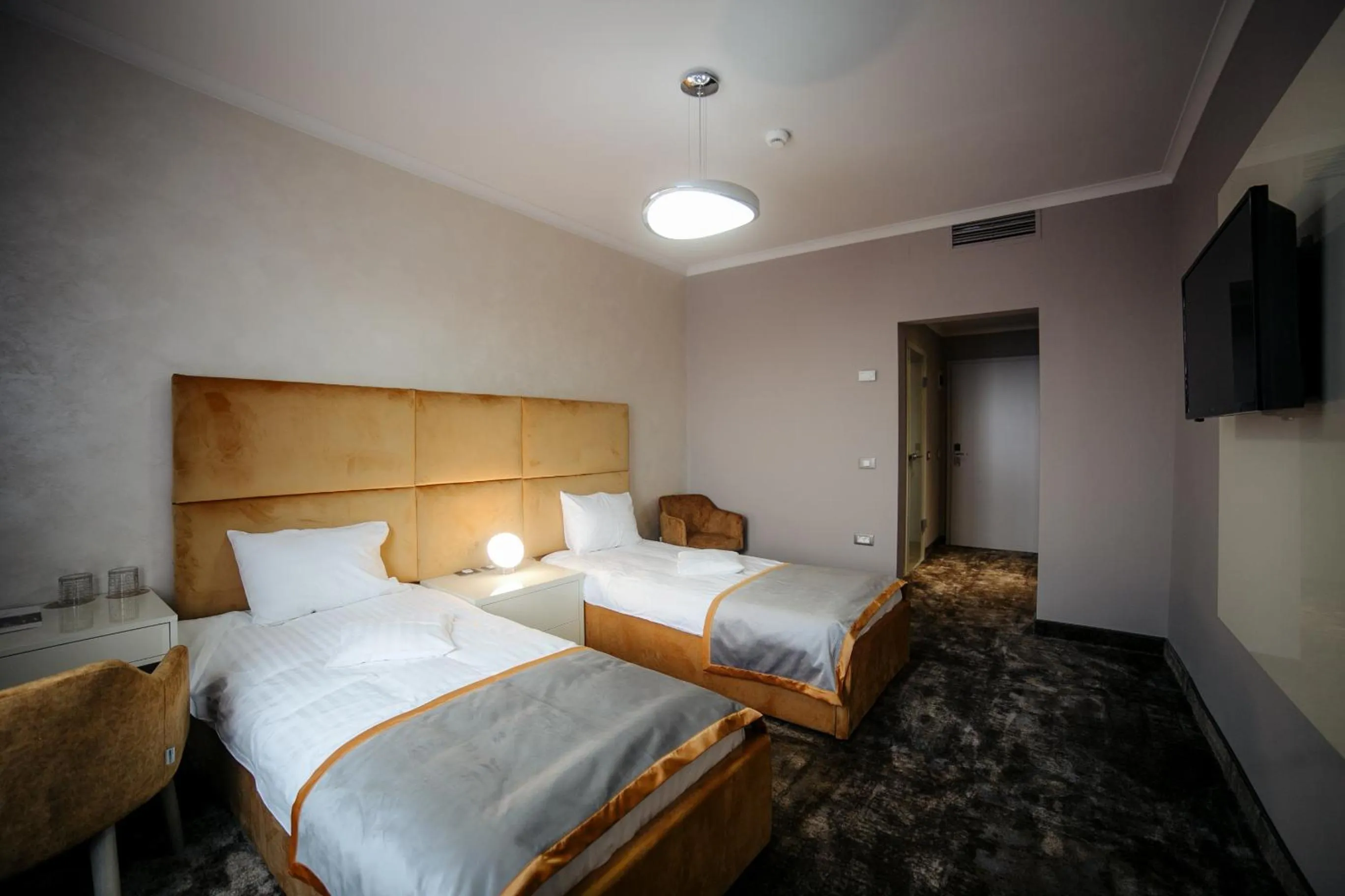 Bed in Royal Class Hotel