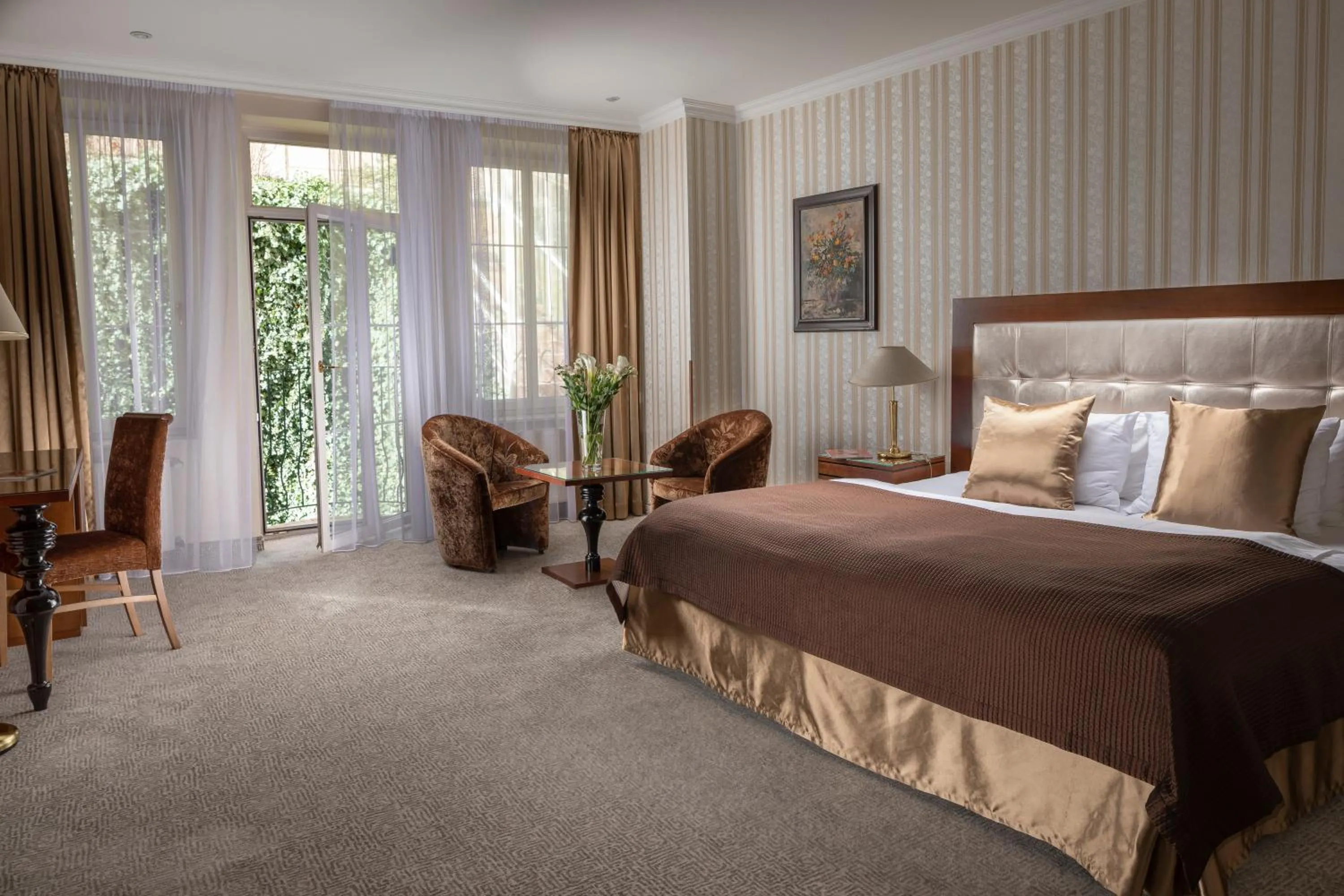 Photo of the whole room, Bed in Promenáda Romantic Hotel