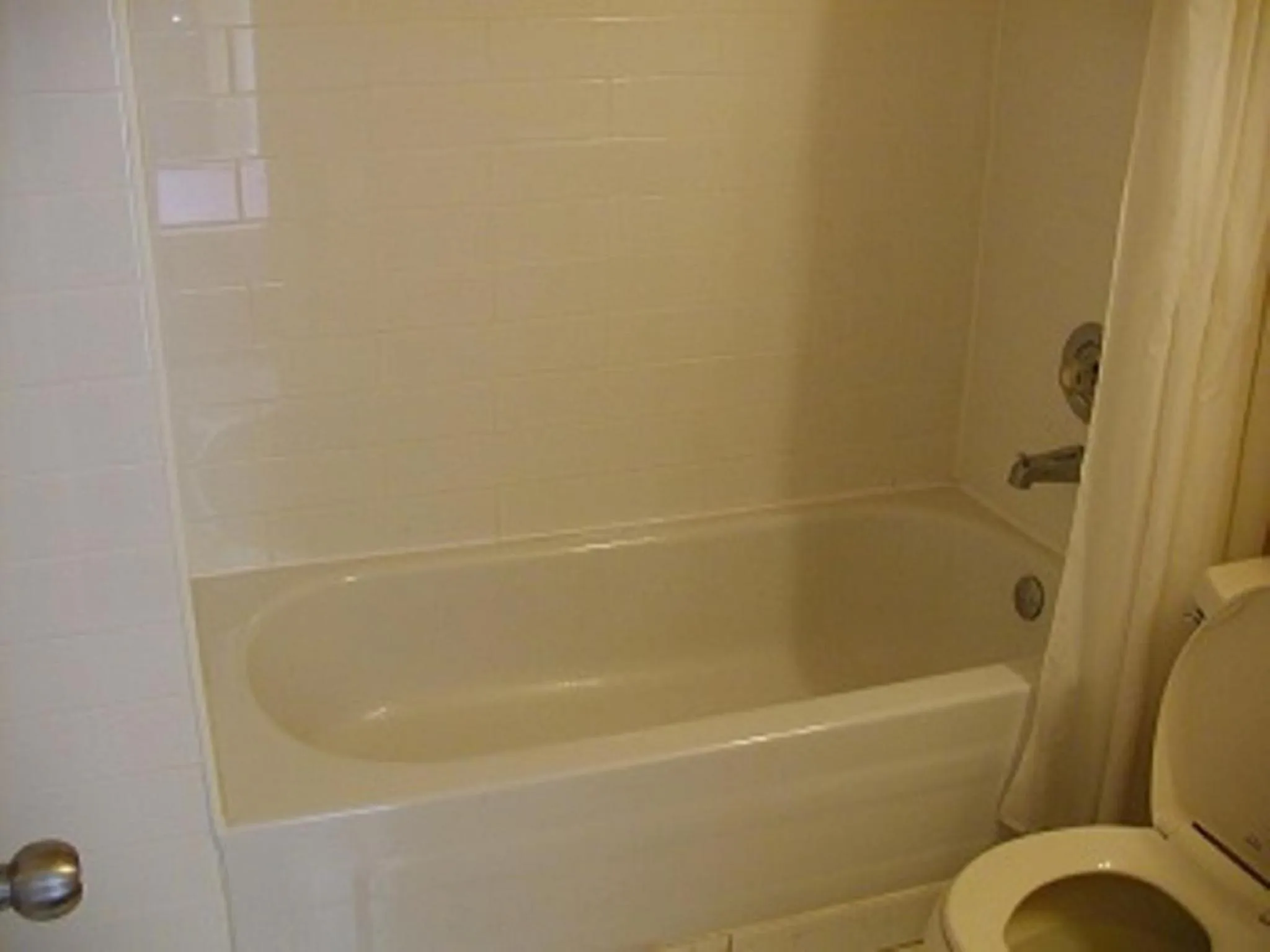 Toilet in Niagara Inn & Suites