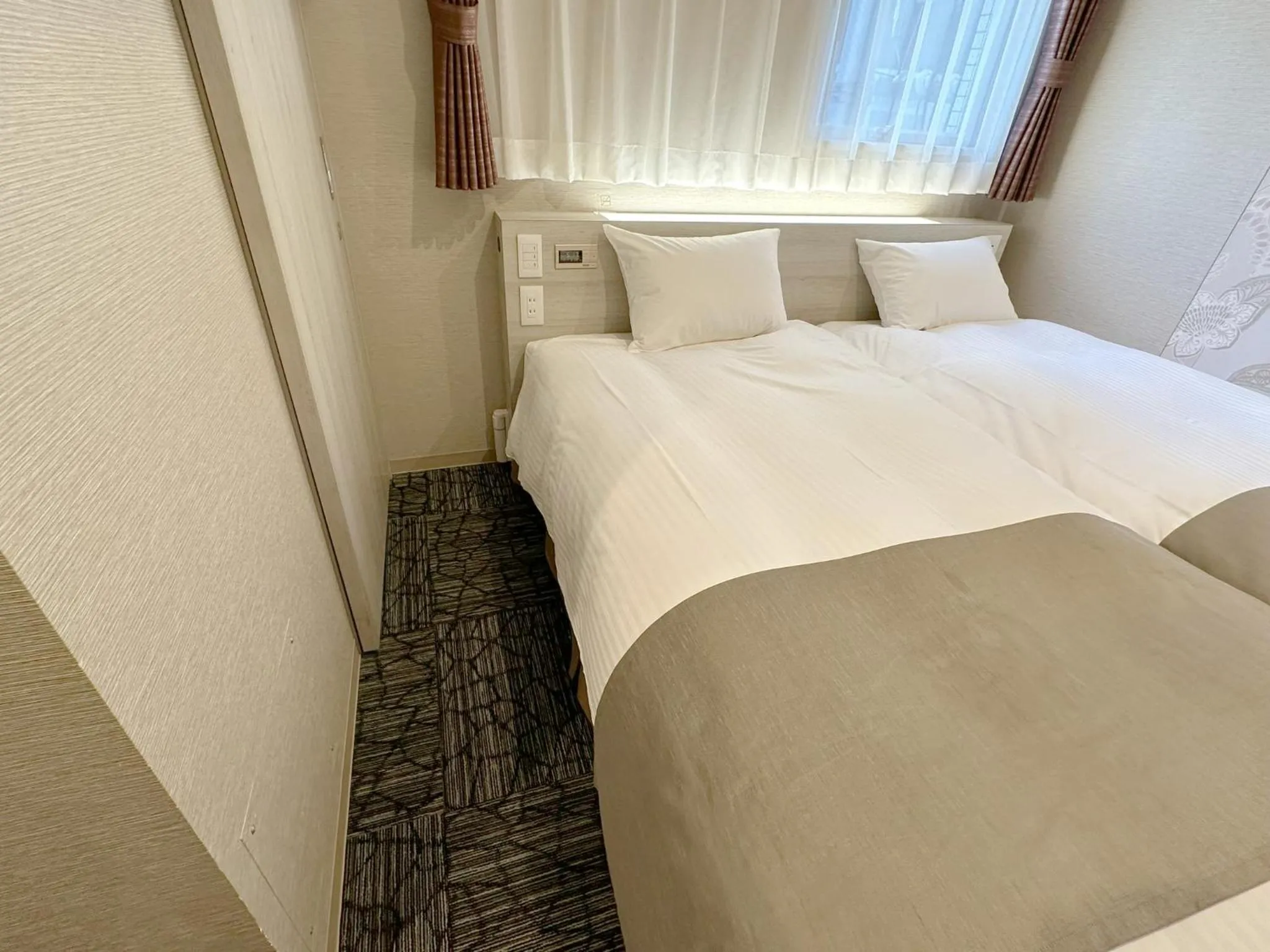 Bed in S.Training Center Hotel Osaka