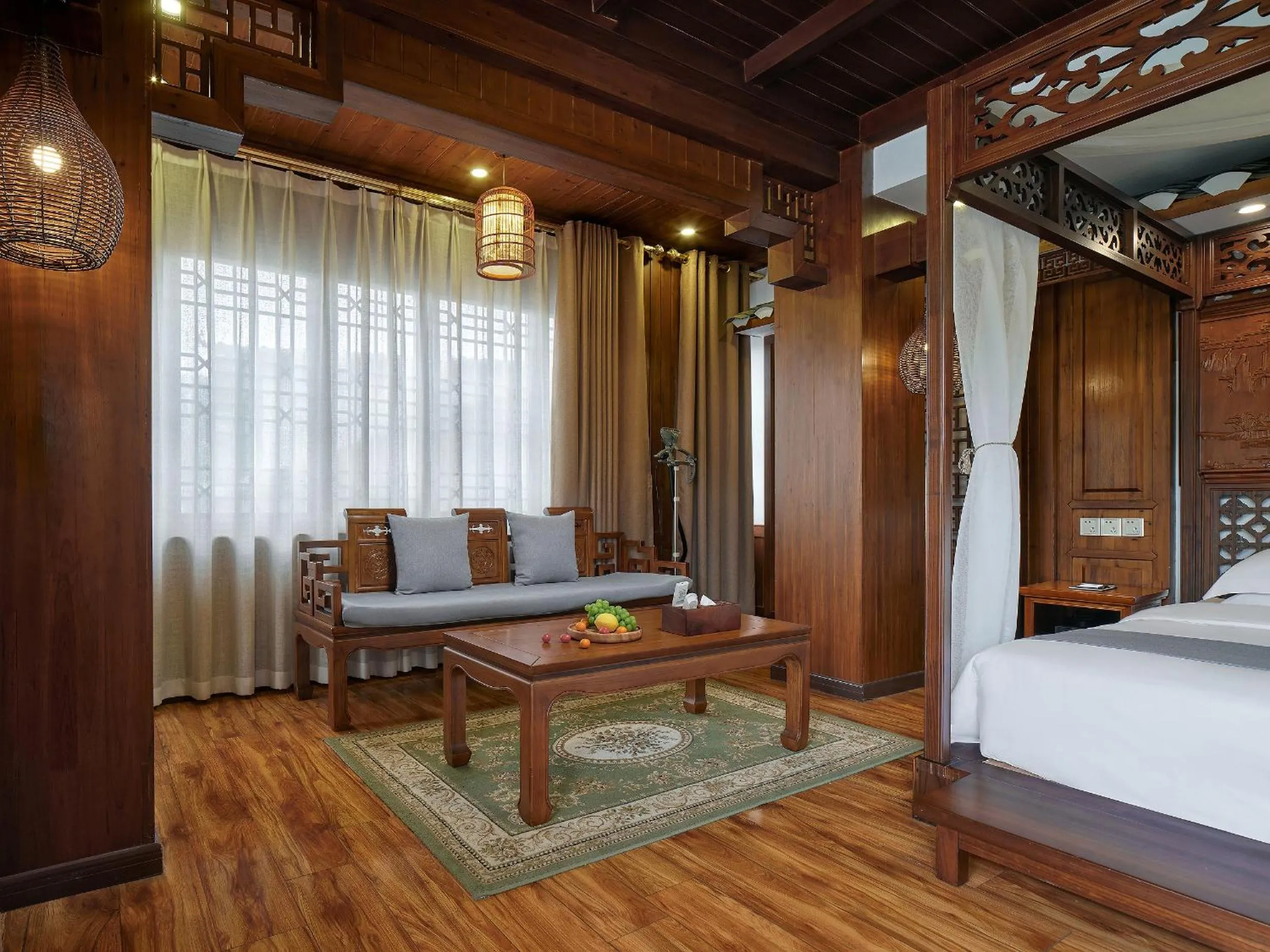 Seating area, Bed in Lee's Boutique Resort