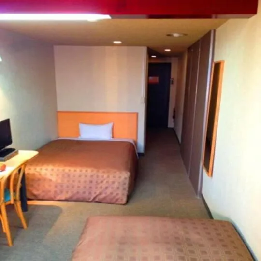 Bed in Takasaki Ekimae Plaza Hotel